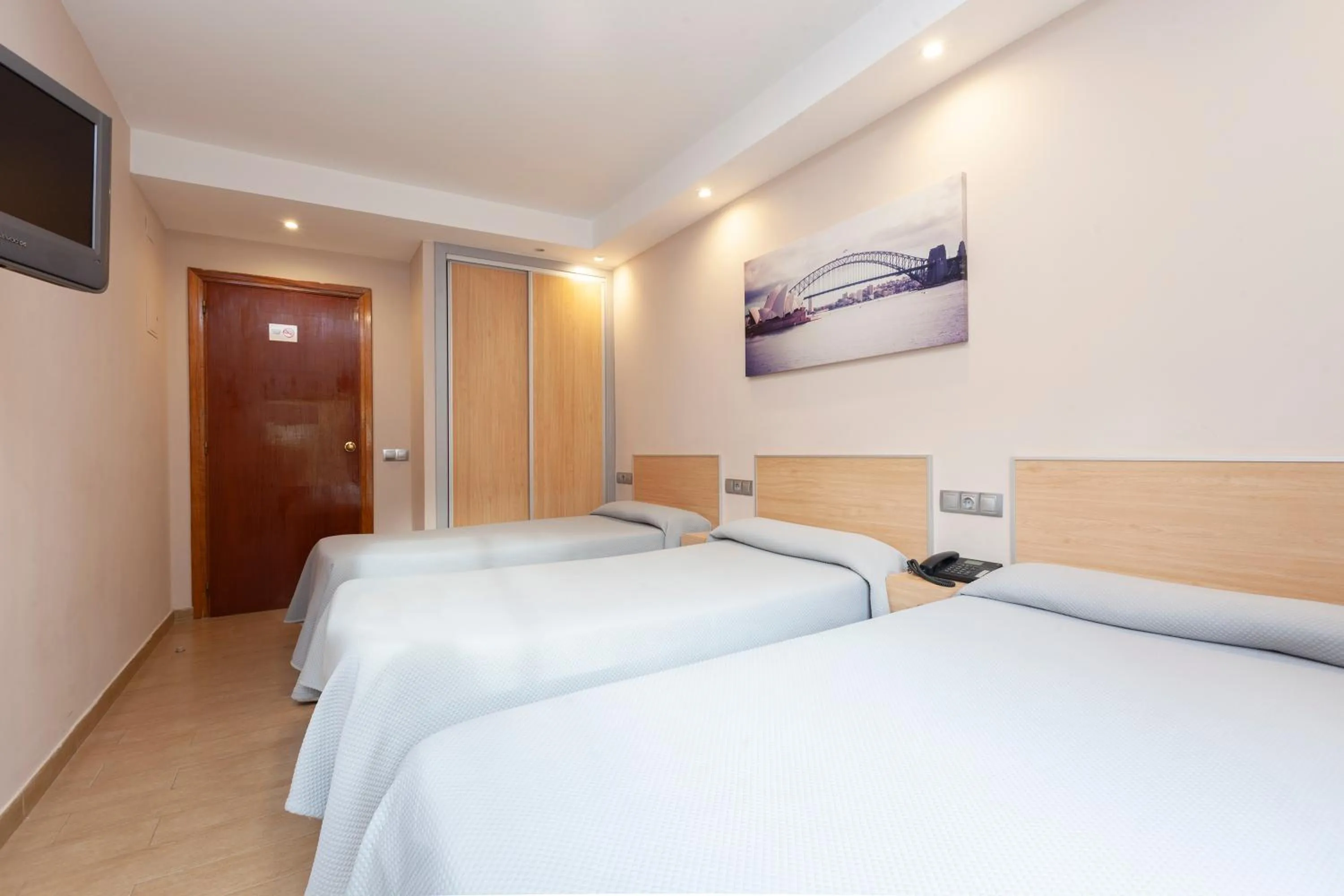 Photo of the whole room, Bed in Hotel Olympia Ronda I