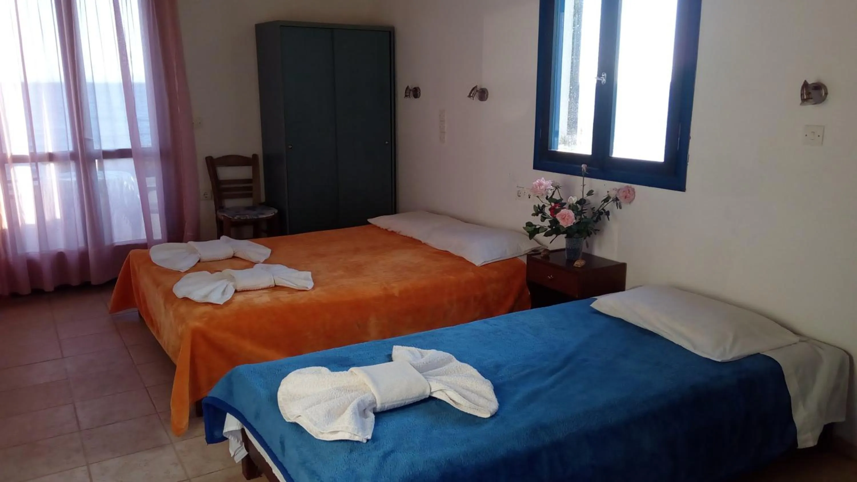 Decorative detail, Bed in Taverna Akrogiali