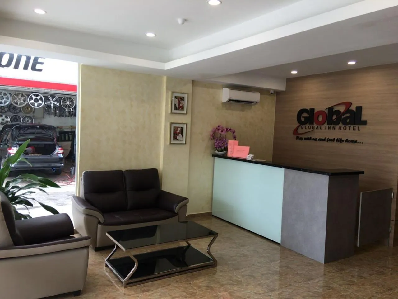 Lobby or reception in Global Inn Hotel