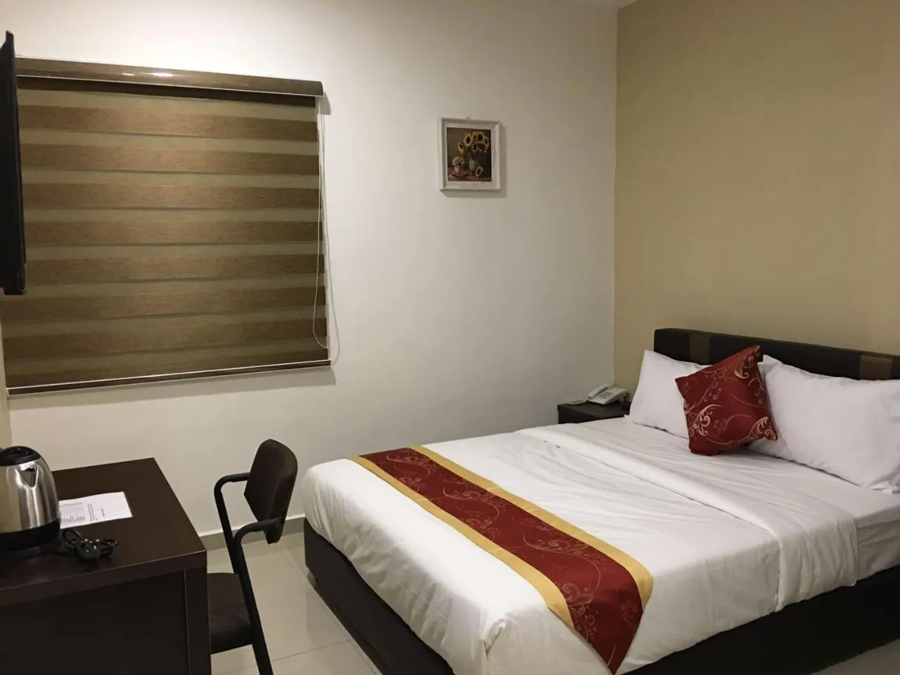 Bed in Global Inn Hotel