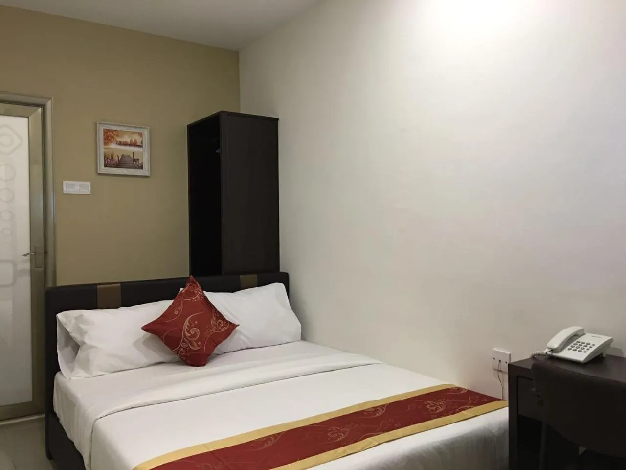Bed in Global Inn Hotel