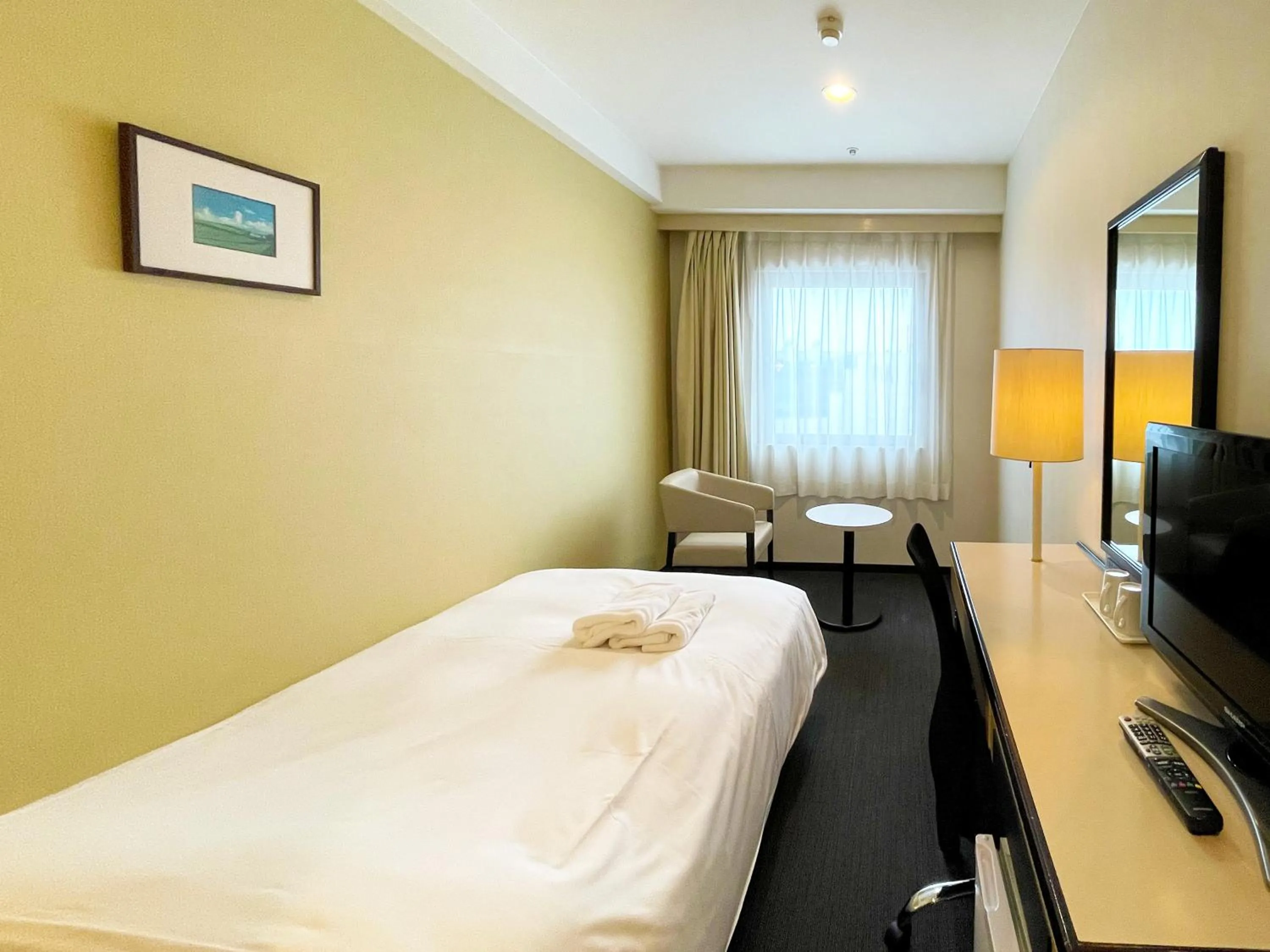 Photo of the whole room, Bed in Smile Hotel Yonago