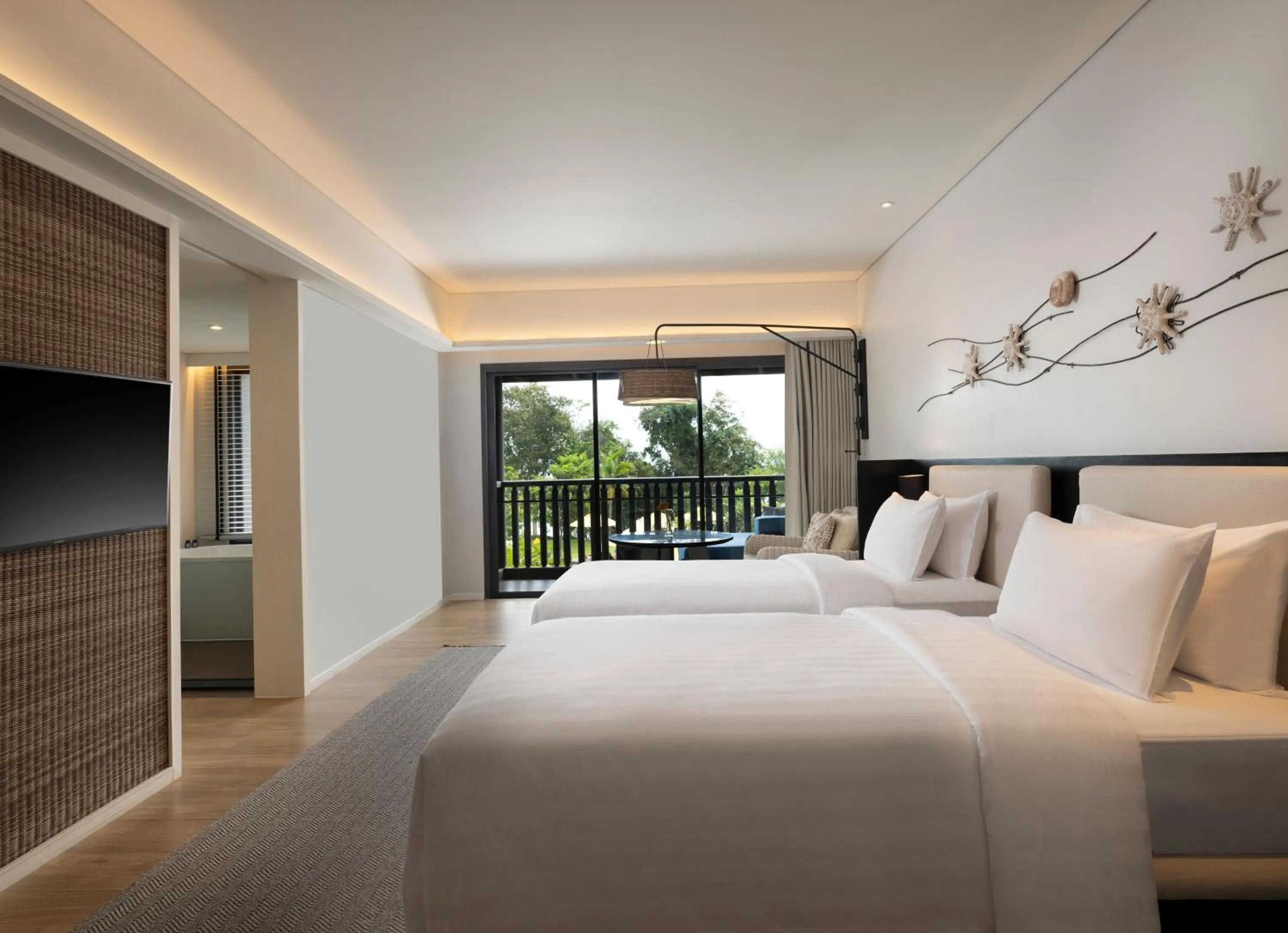 Bed in The ShellSea Krabi I Luxury Beach Front Resort & Pool Villa