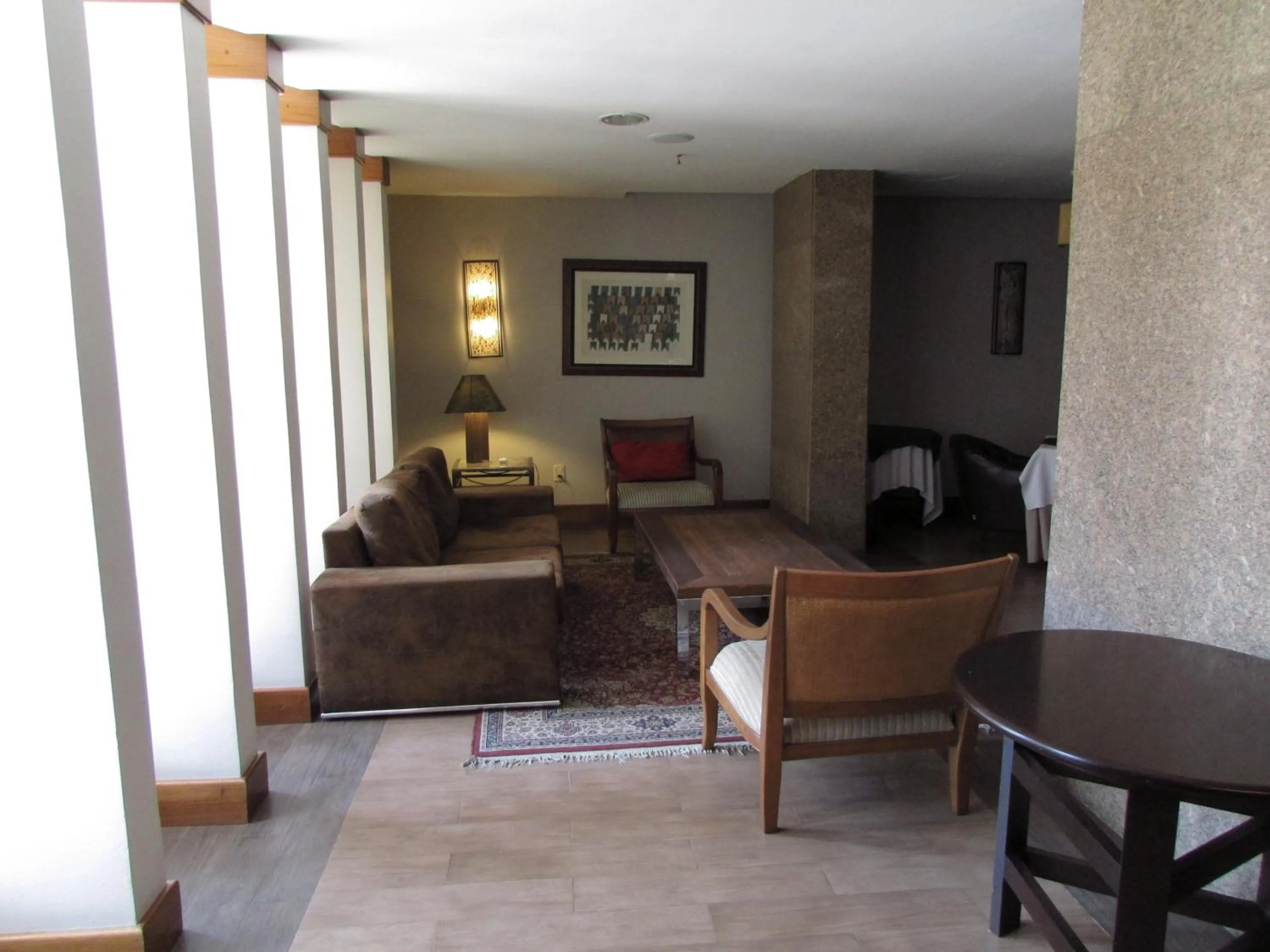 Communal lounge/ TV room in Continental Porto Alegre by Samba