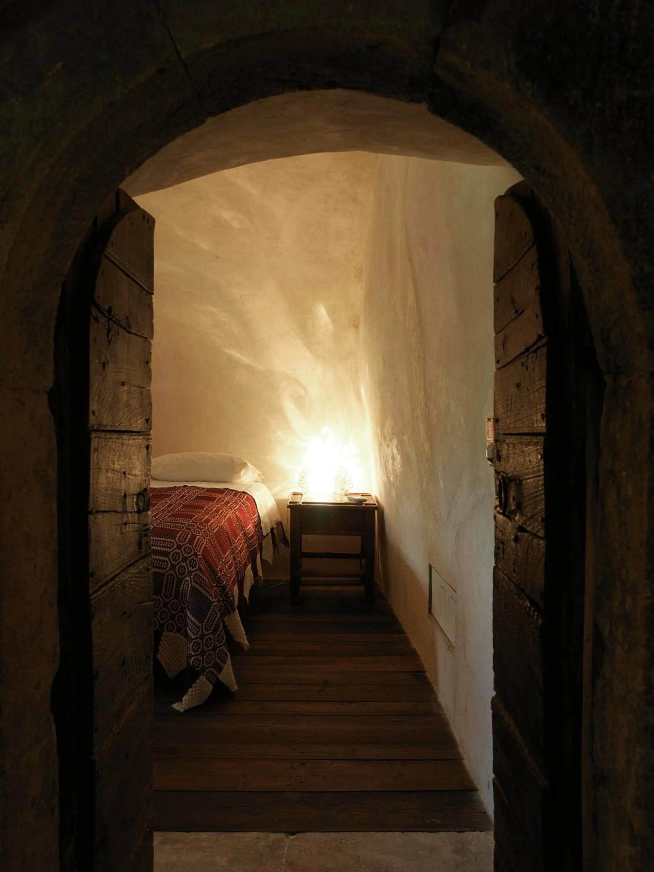 Photo of the whole room, Bed in Sextantio Albergo Diffuso