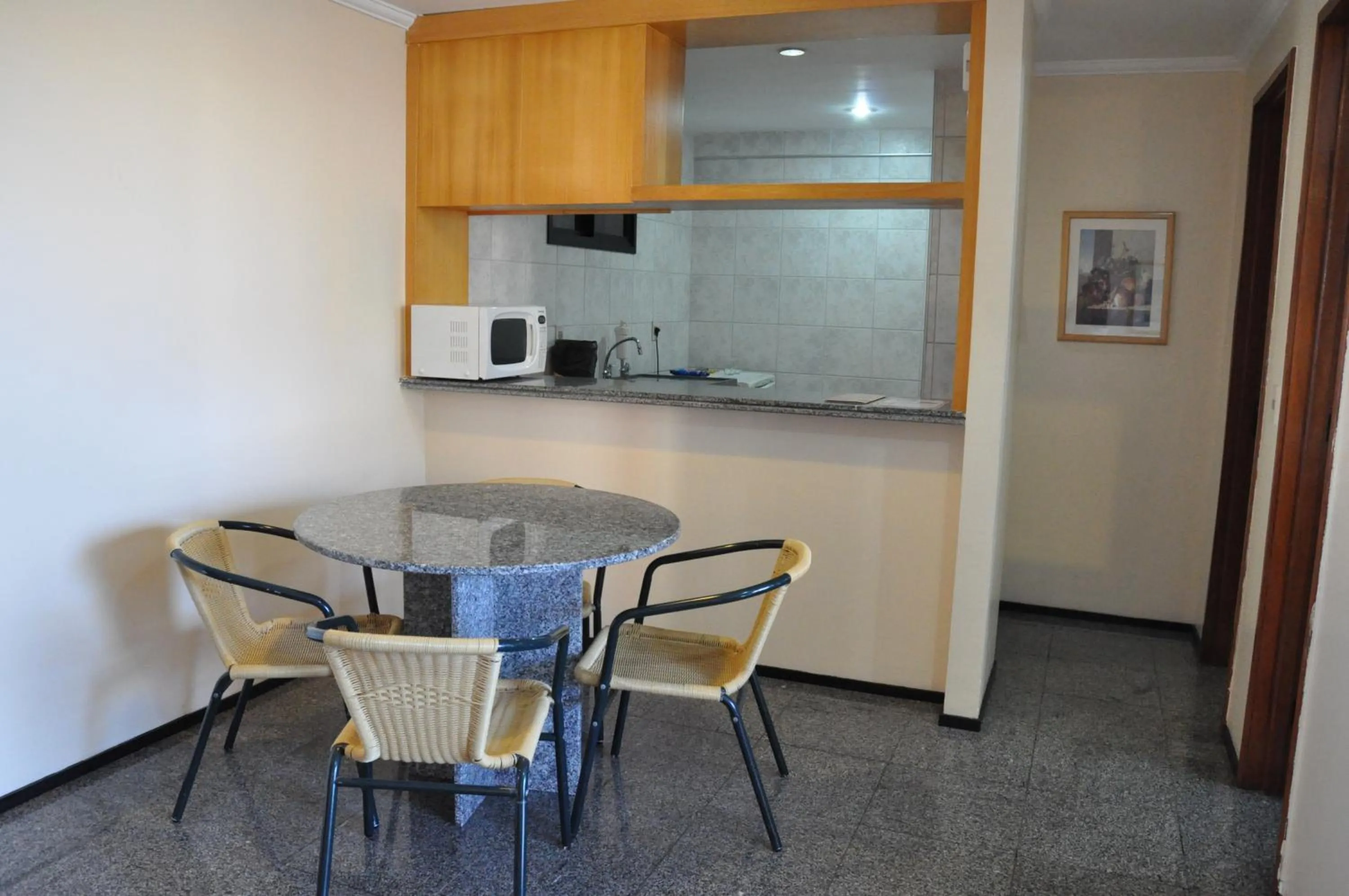 Seating area, Kitchen/Kitchenette in JOH Blue Ocean Flat Hotel