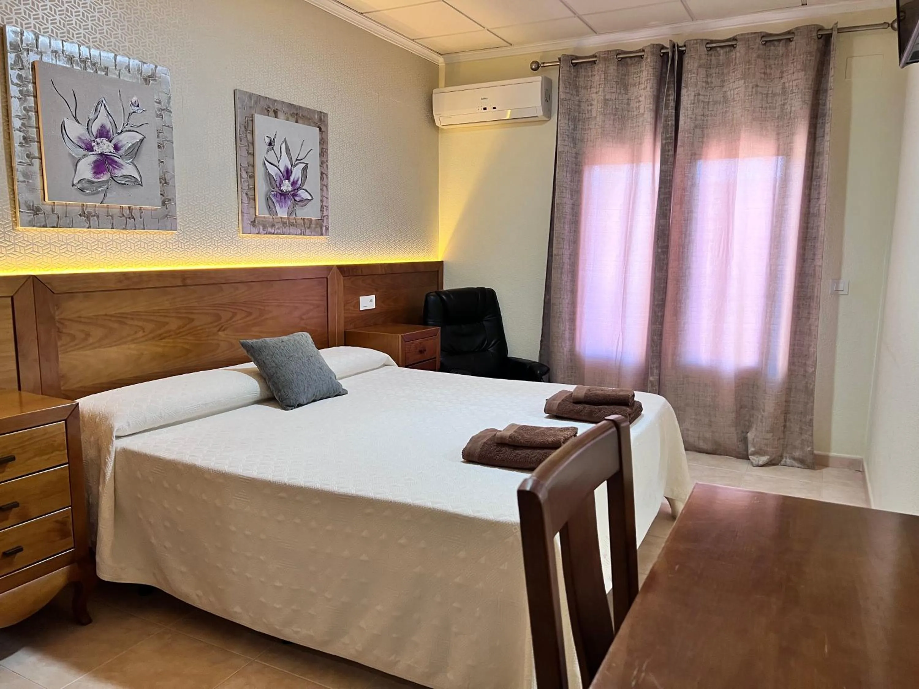 Bed in Hotel Don Juan