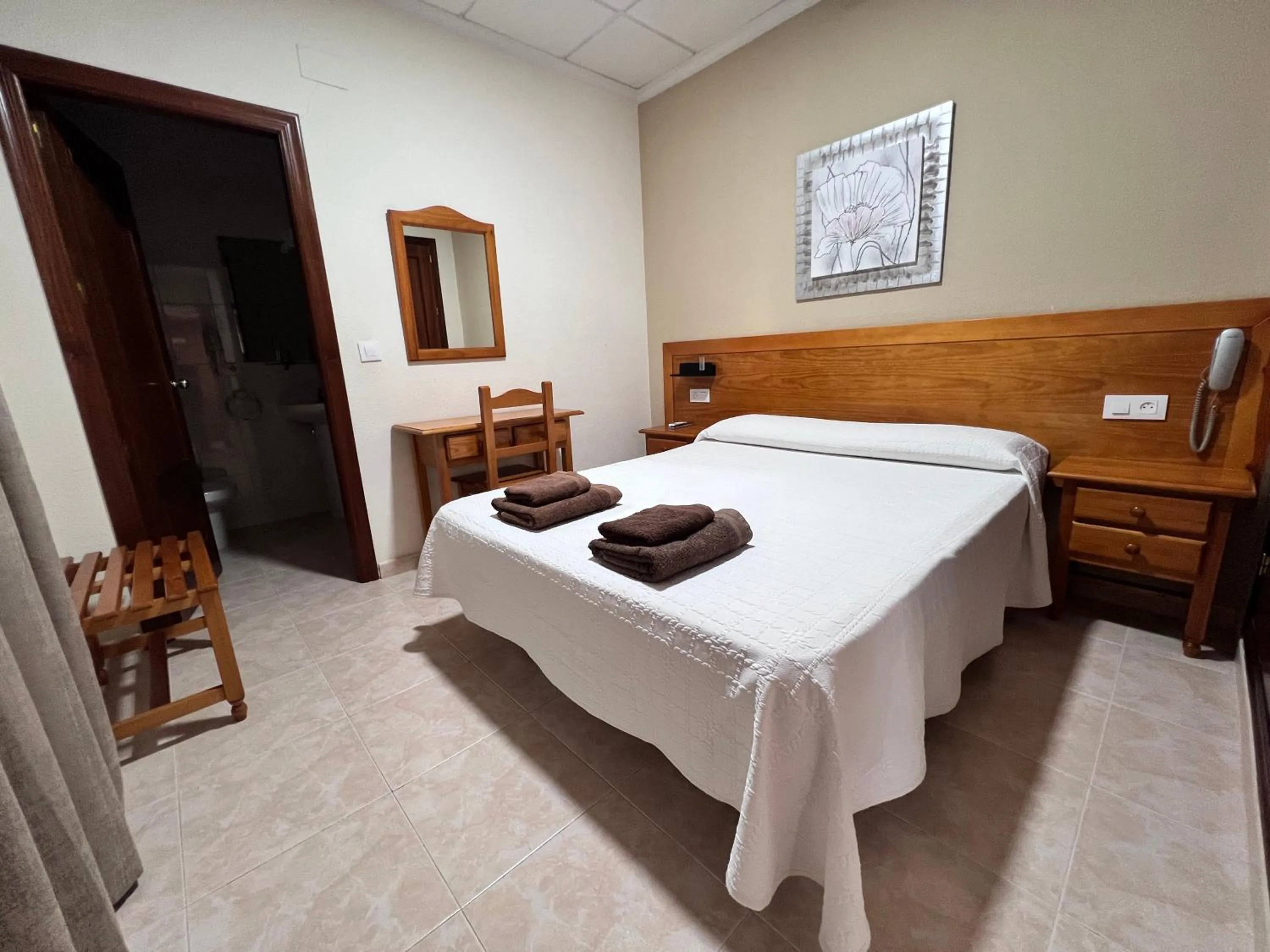 Bed in Hotel Don Juan