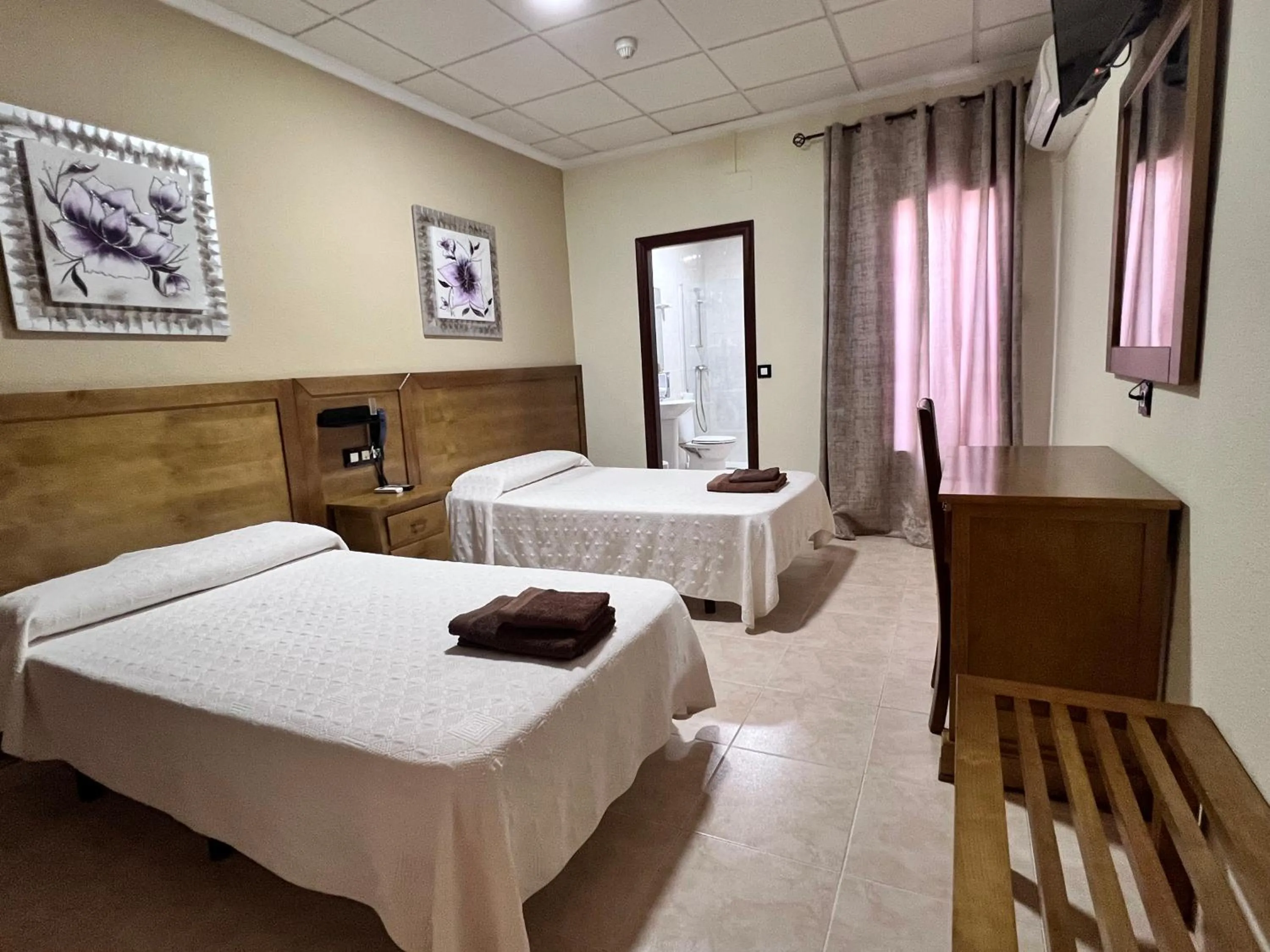 Bed in Hotel Don Juan