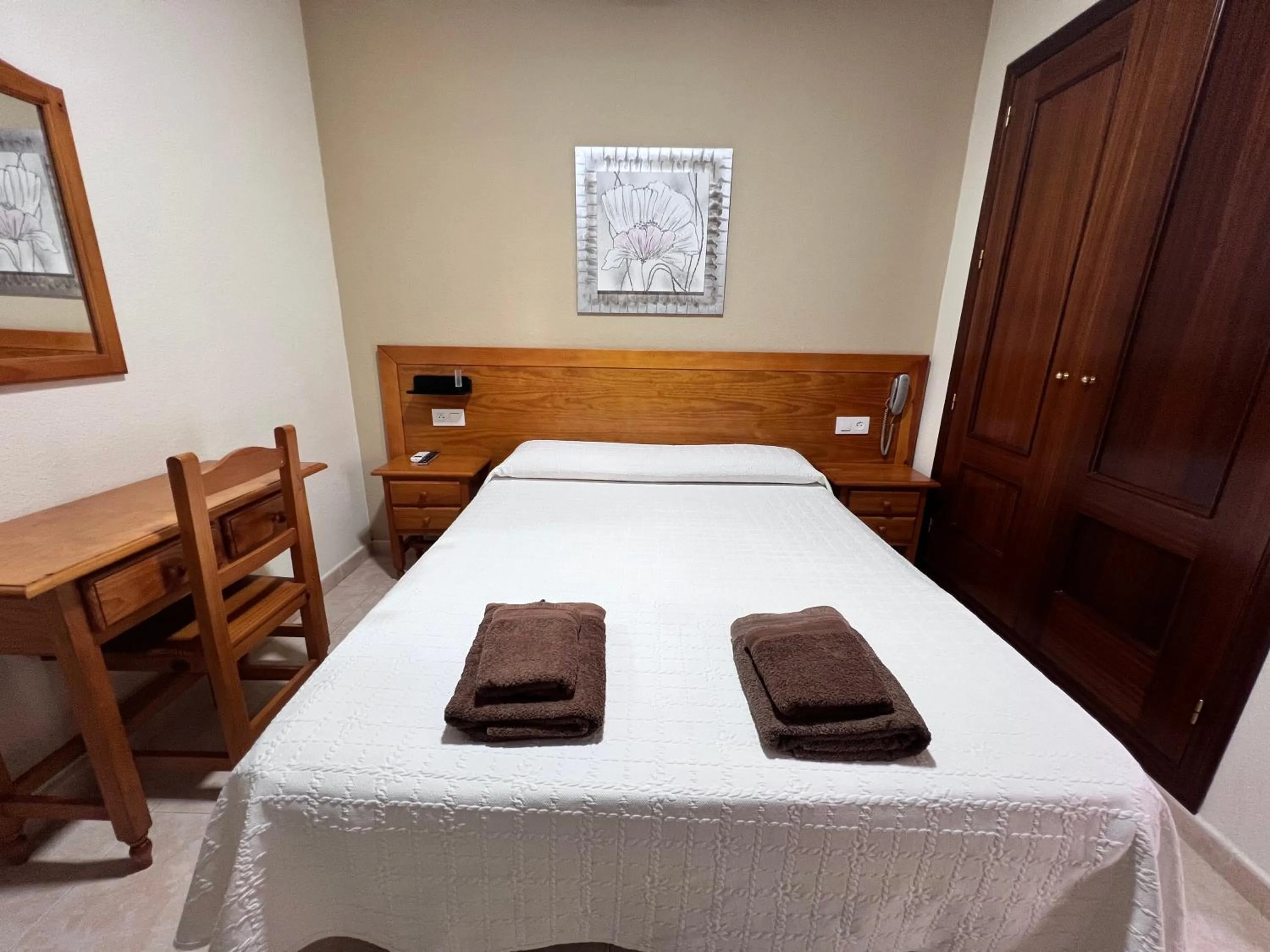 Bed in Hotel Don Juan