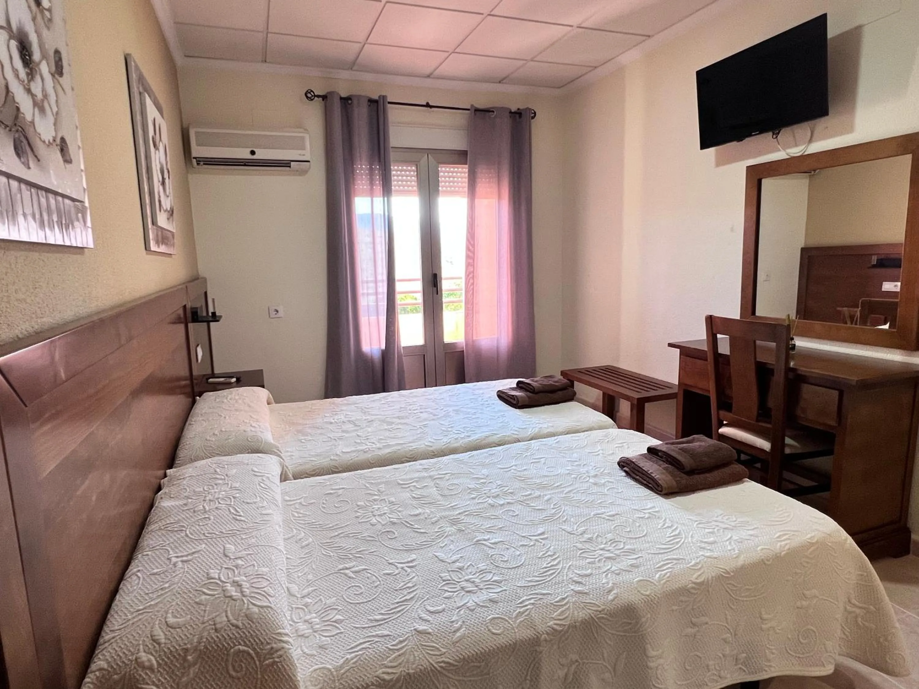 Bed in Hotel Don Juan