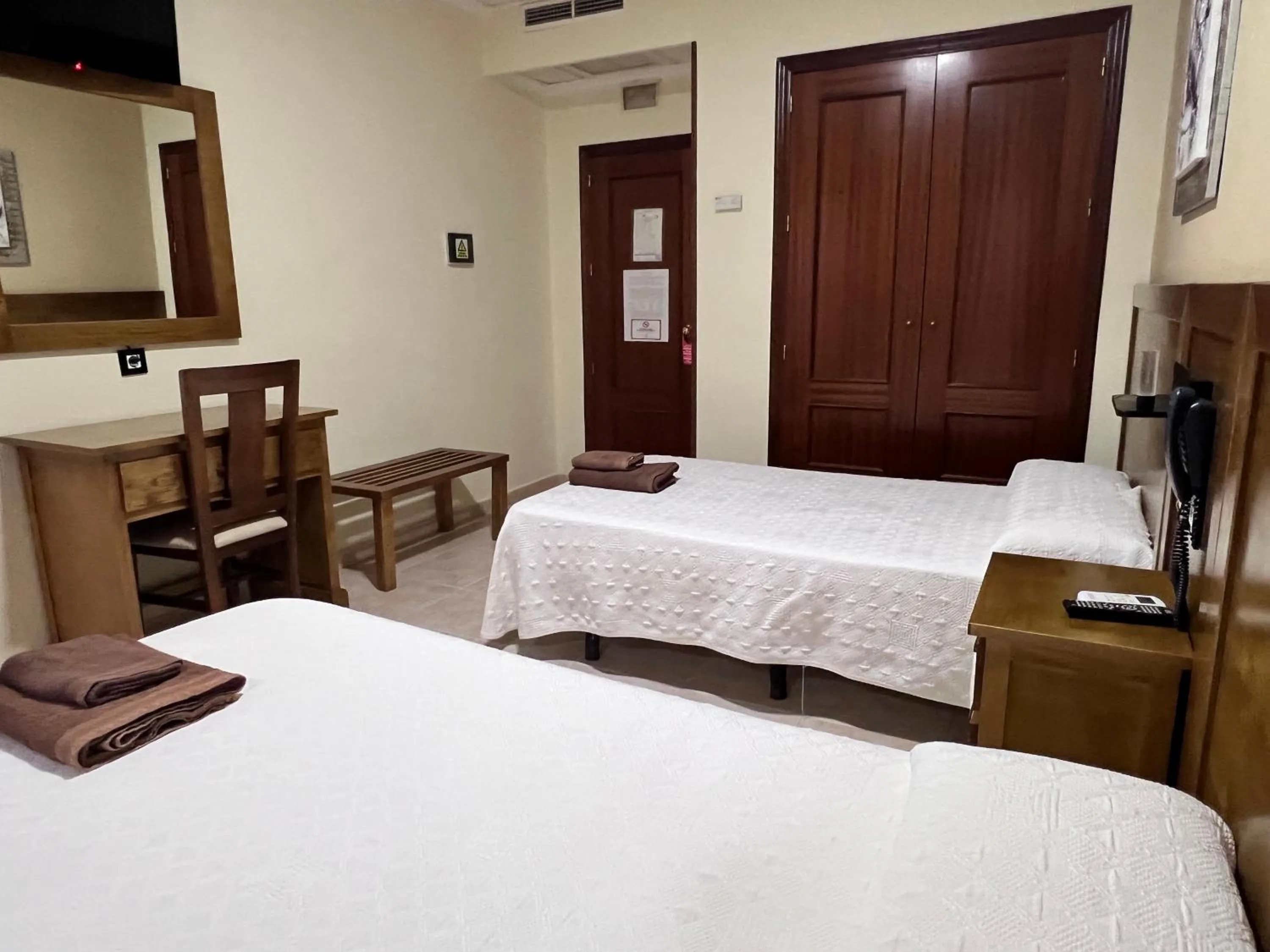 Bed in Hotel Don Juan