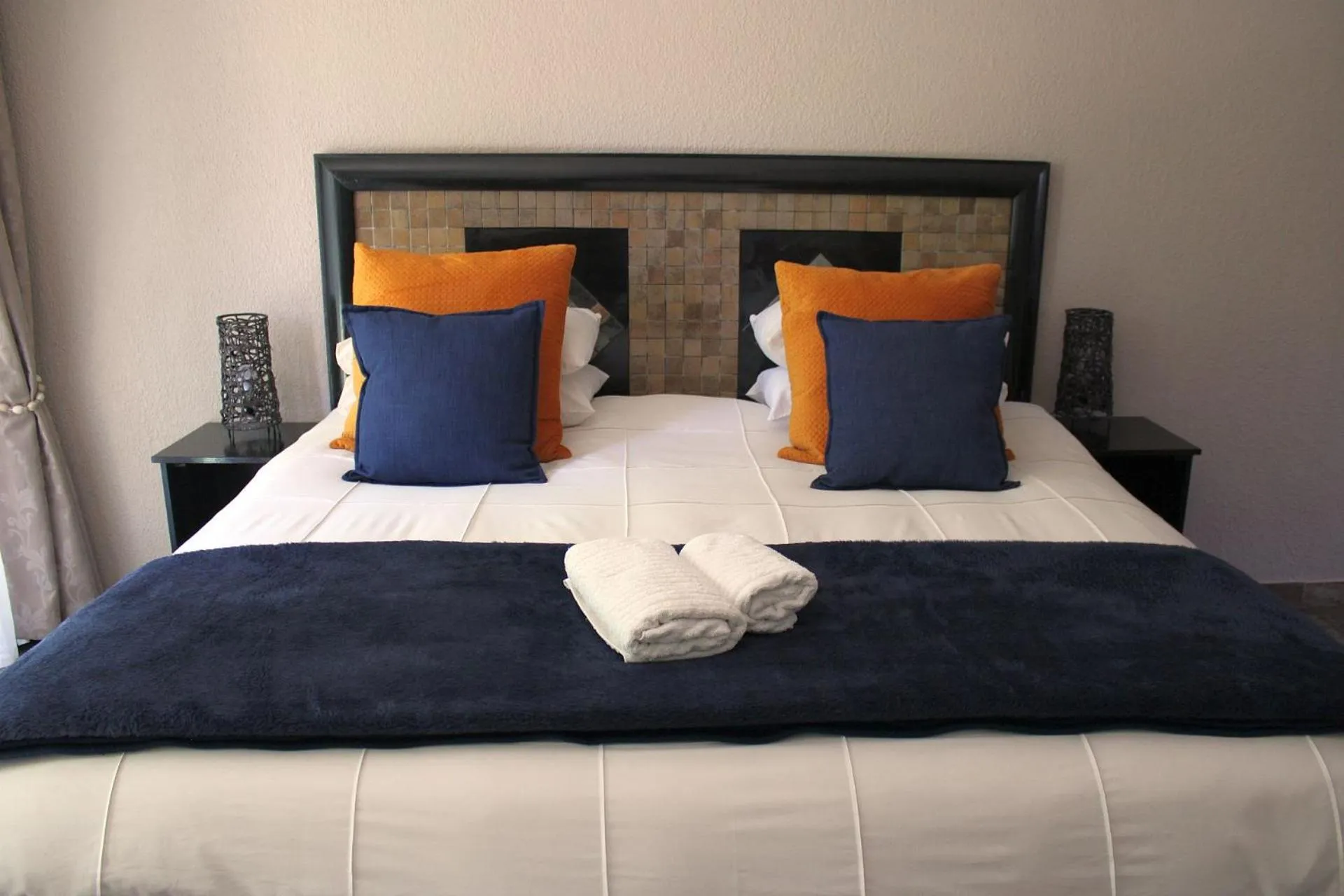 Bed in Ukarimu Guest House