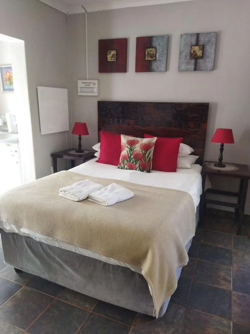 Bed in Ukarimu Guest House