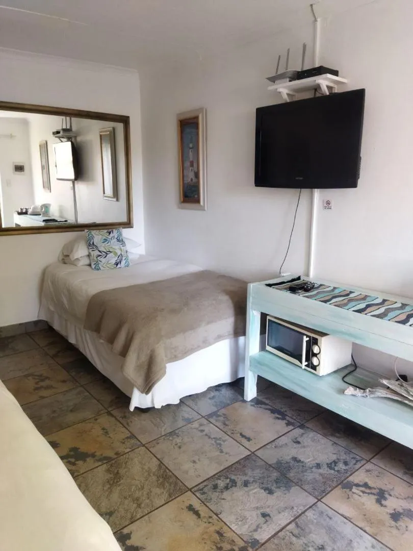 Bed in Ukarimu Guest House