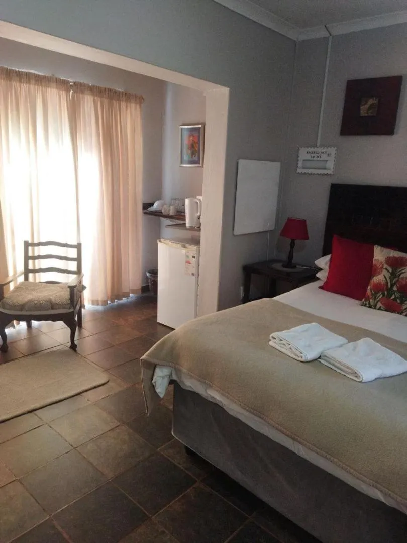 Bed in Ukarimu Guest House