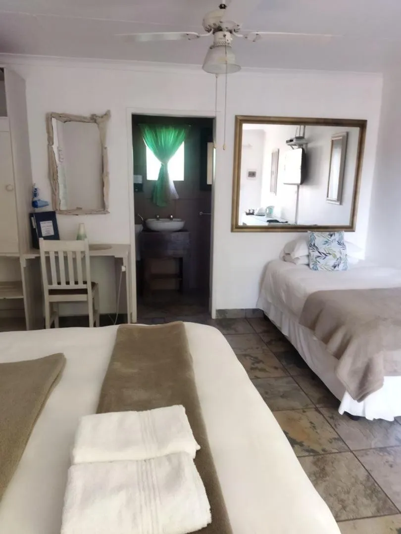 Bed in Ukarimu Guest House