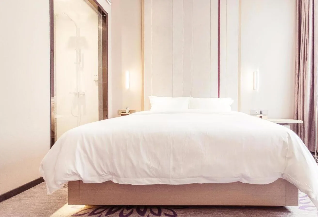 Bed in Lavande Hotel Suzhou Guanqian