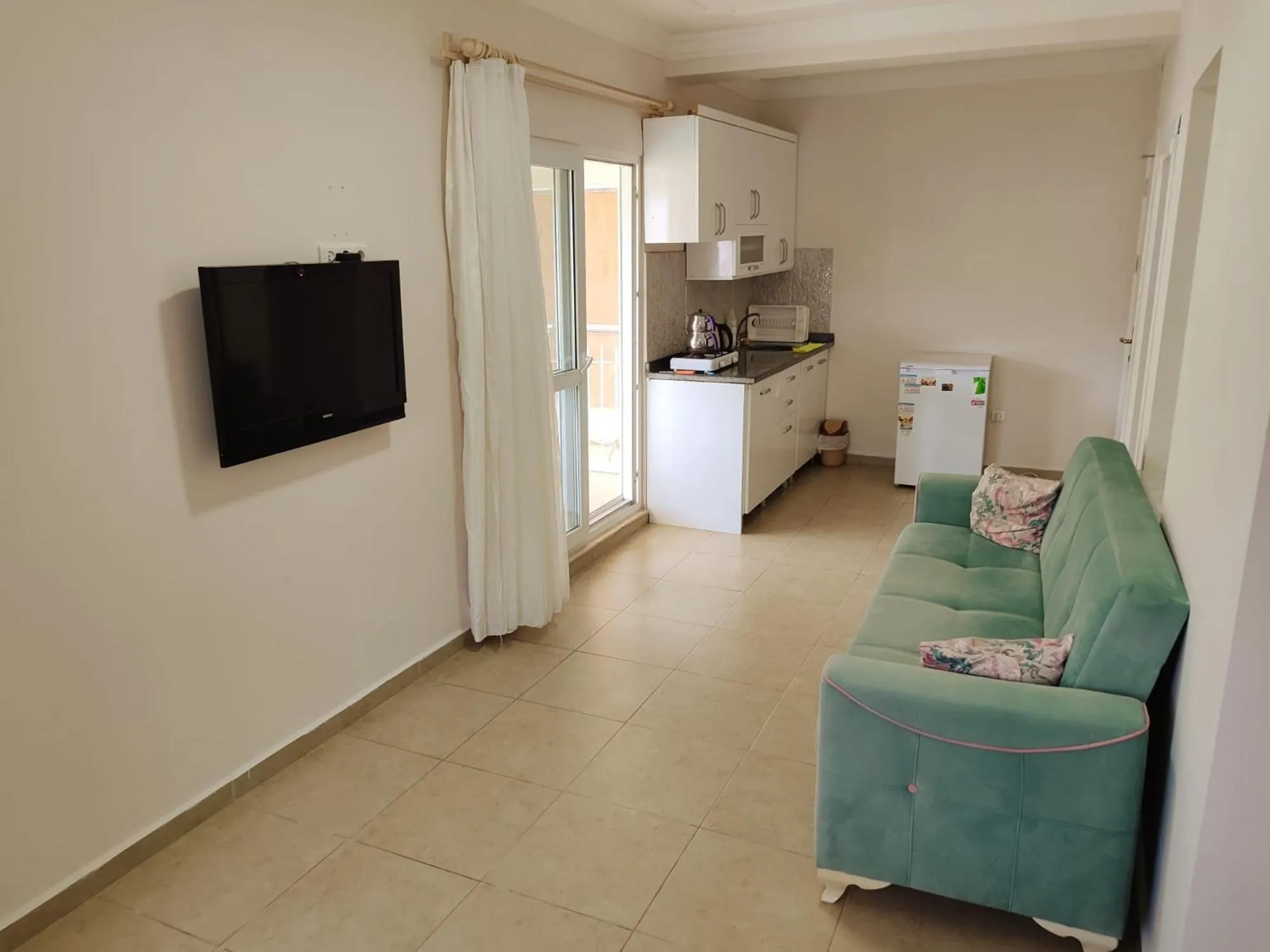 TV and multimedia in Bucak Apart Hotel Göcek & Beach