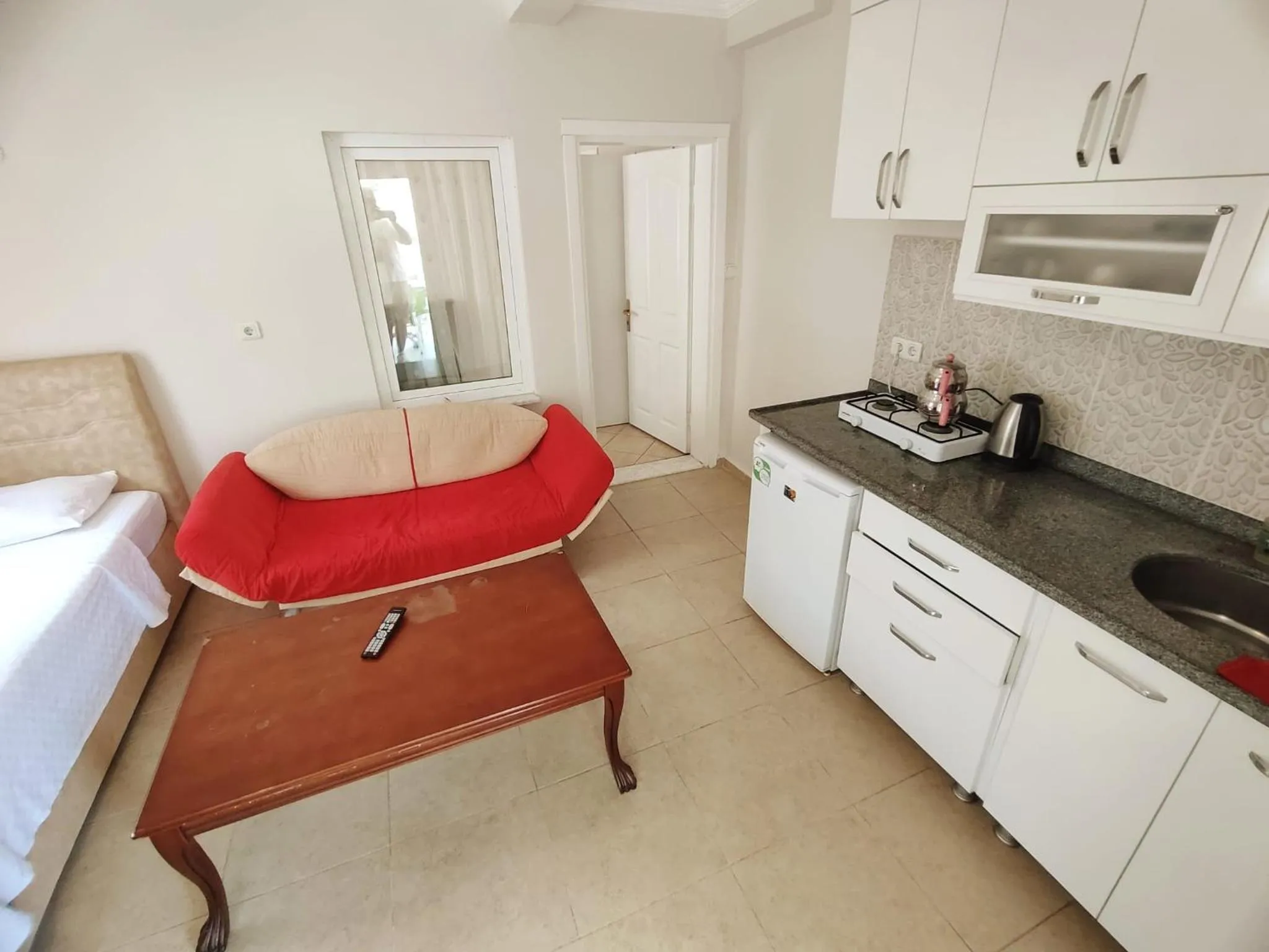 Kitchen or kitchenette in Bucak Apart Hotel Göcek & Beach