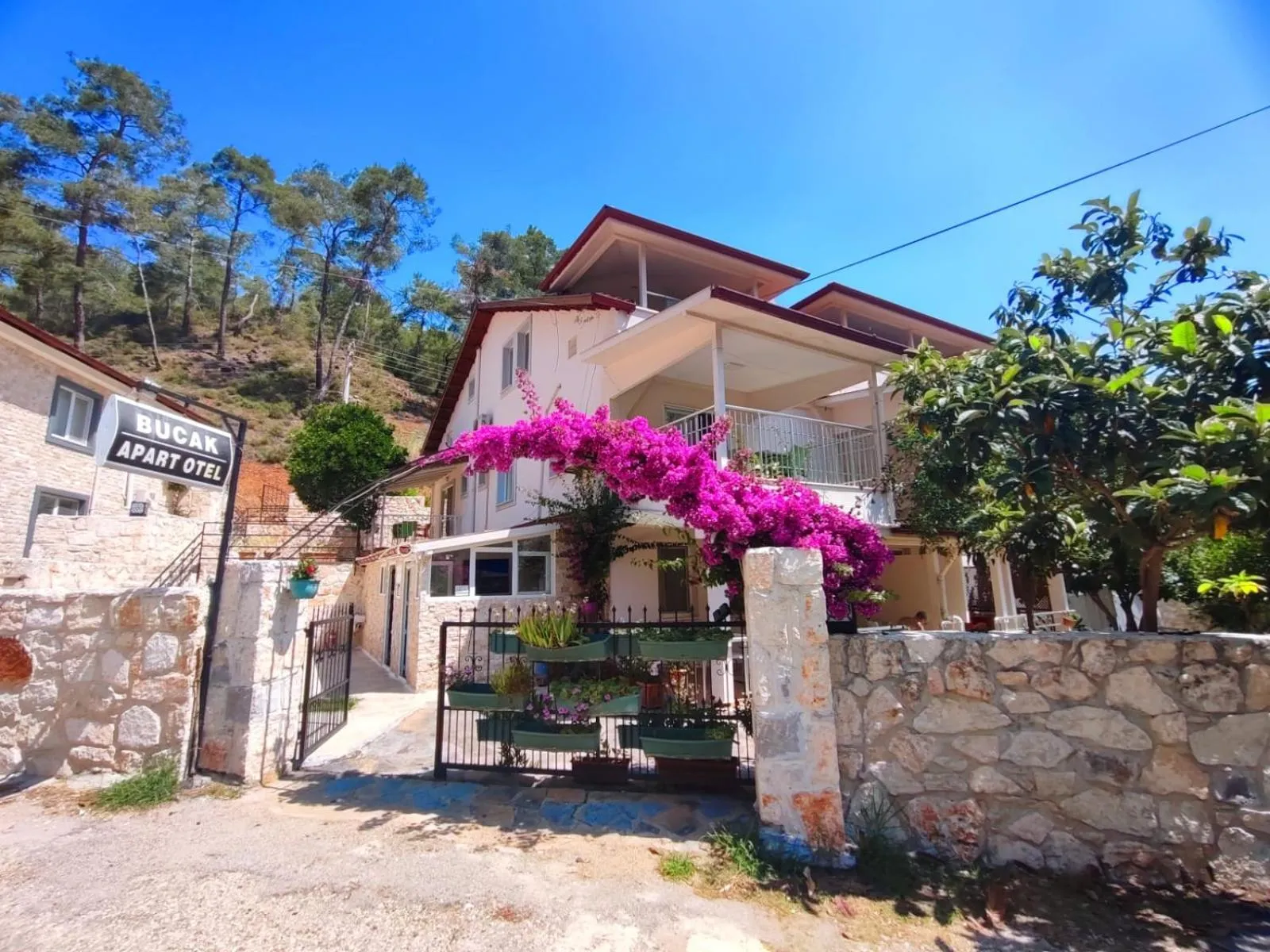Property logo or sign in Bucak Apart Hotel Göcek & Beach