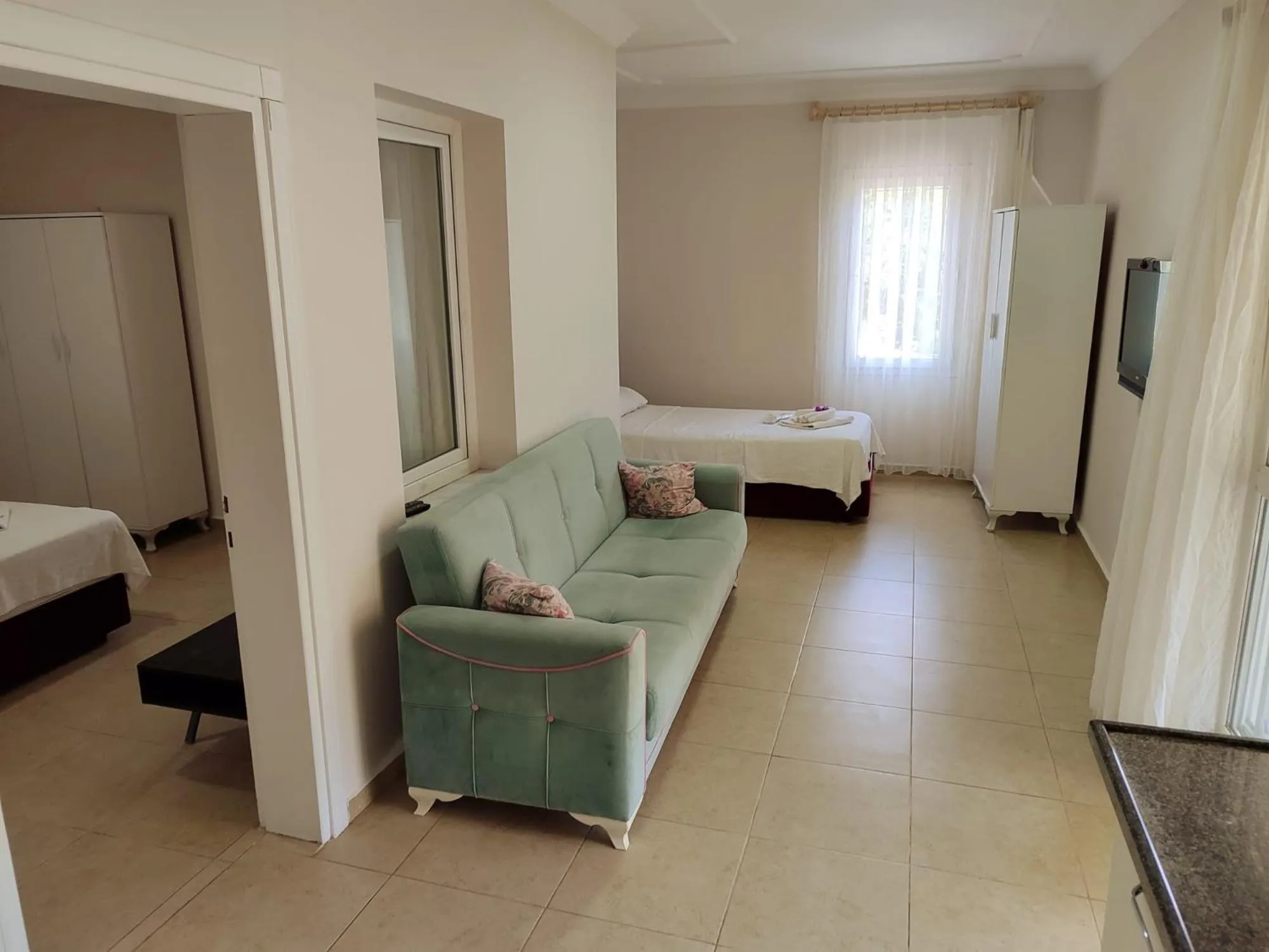 Living room, Bed in Bucak Apart Hotel Göcek & Beach