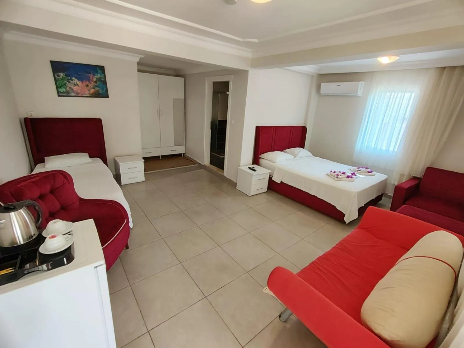 Photo of the whole room, Bed in Bucak Apart Hotel Göcek & Beach