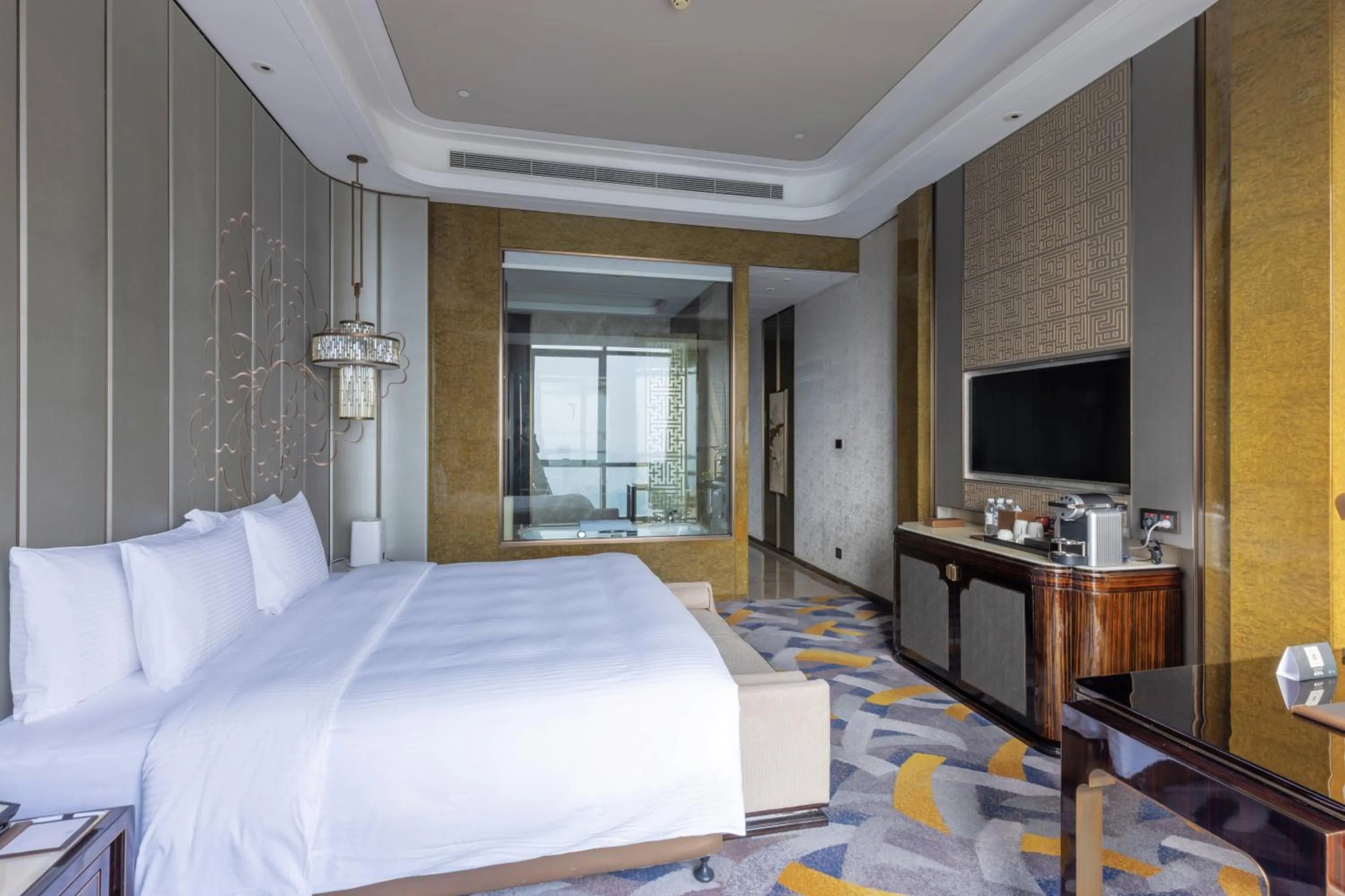 Photo of the whole room, Bed in Wanda Vista Zhengzhou