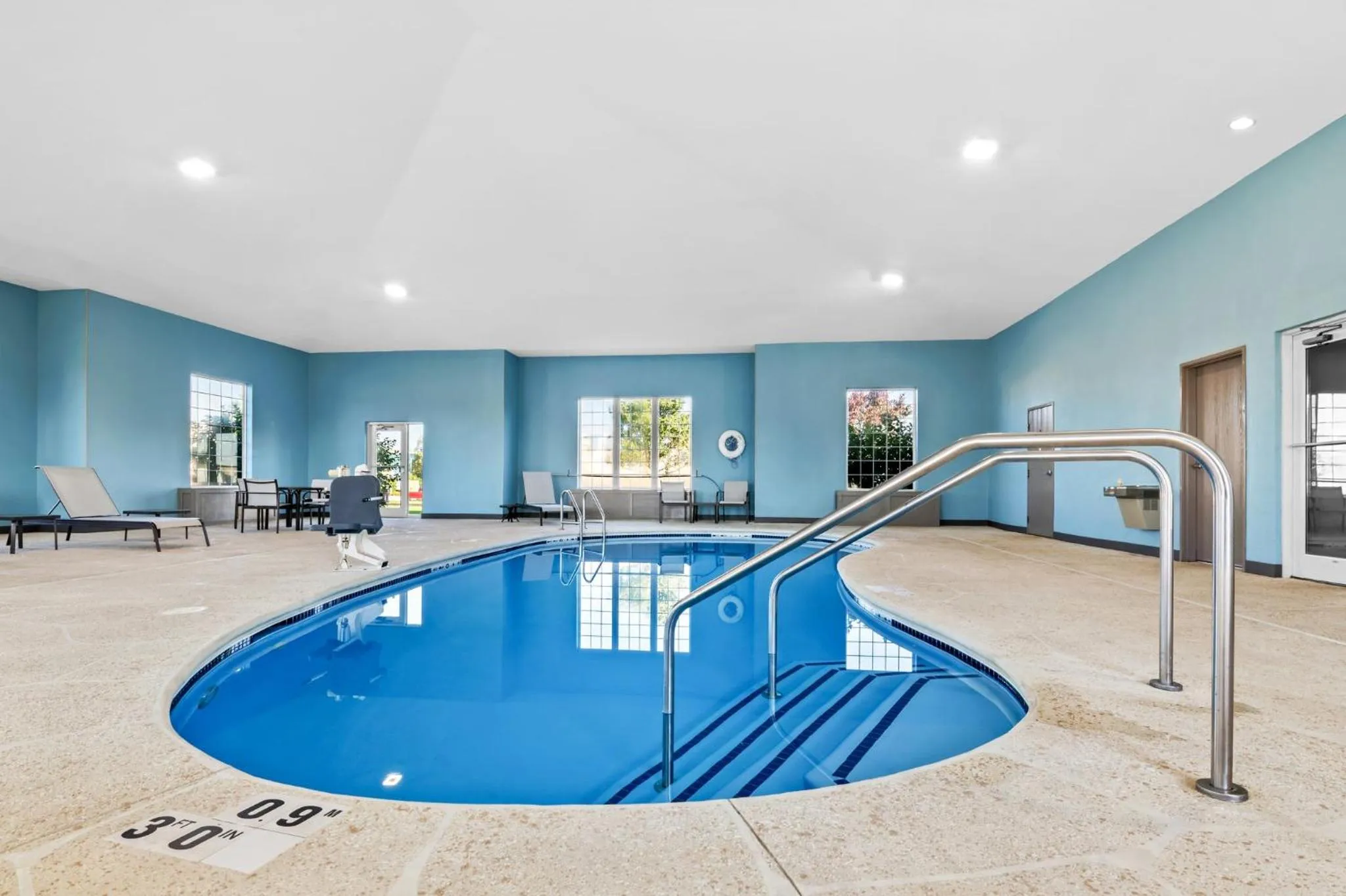 Swimming pool in Holiday Inn Express Hotel & Suites Council Bluffs - Convention Center Area by IHG