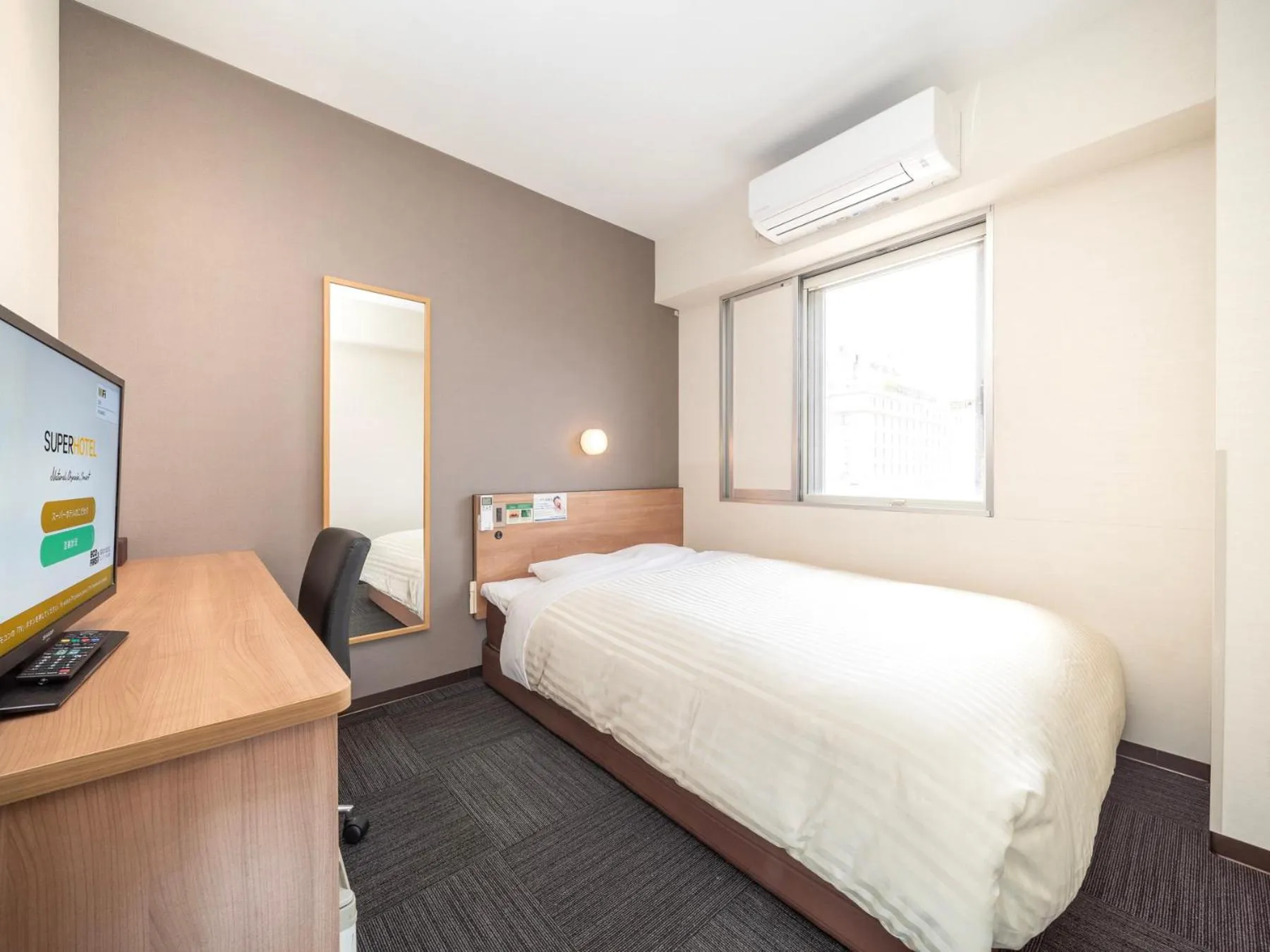 Bed in Super Hotel Yamaguchi Yuda Onsen
