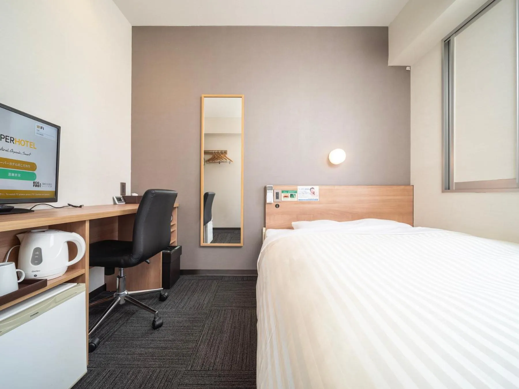 Bed in Super Hotel Yamaguchi Yuda Onsen