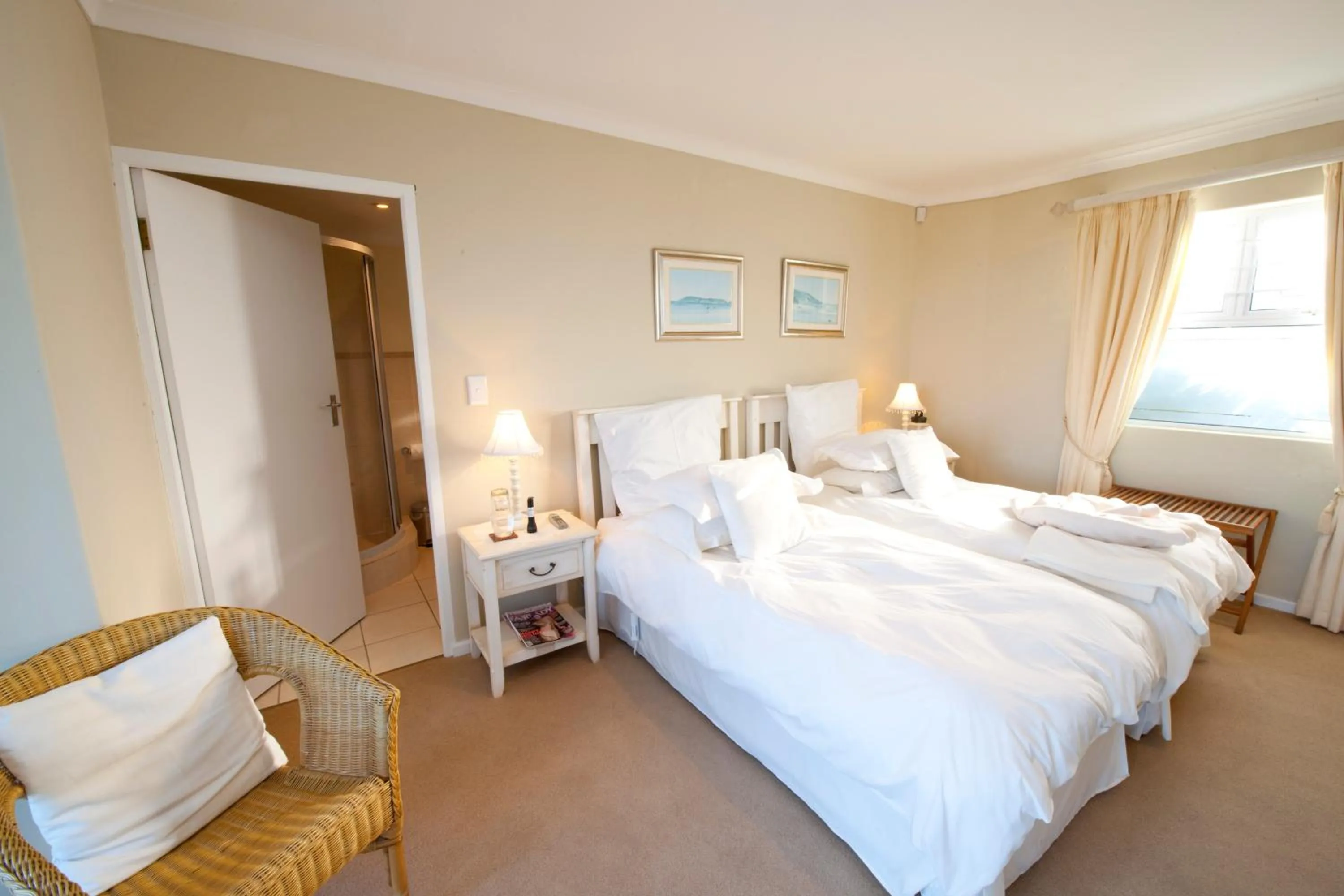 Bed in Dolphins' Playground Beachfront B&B