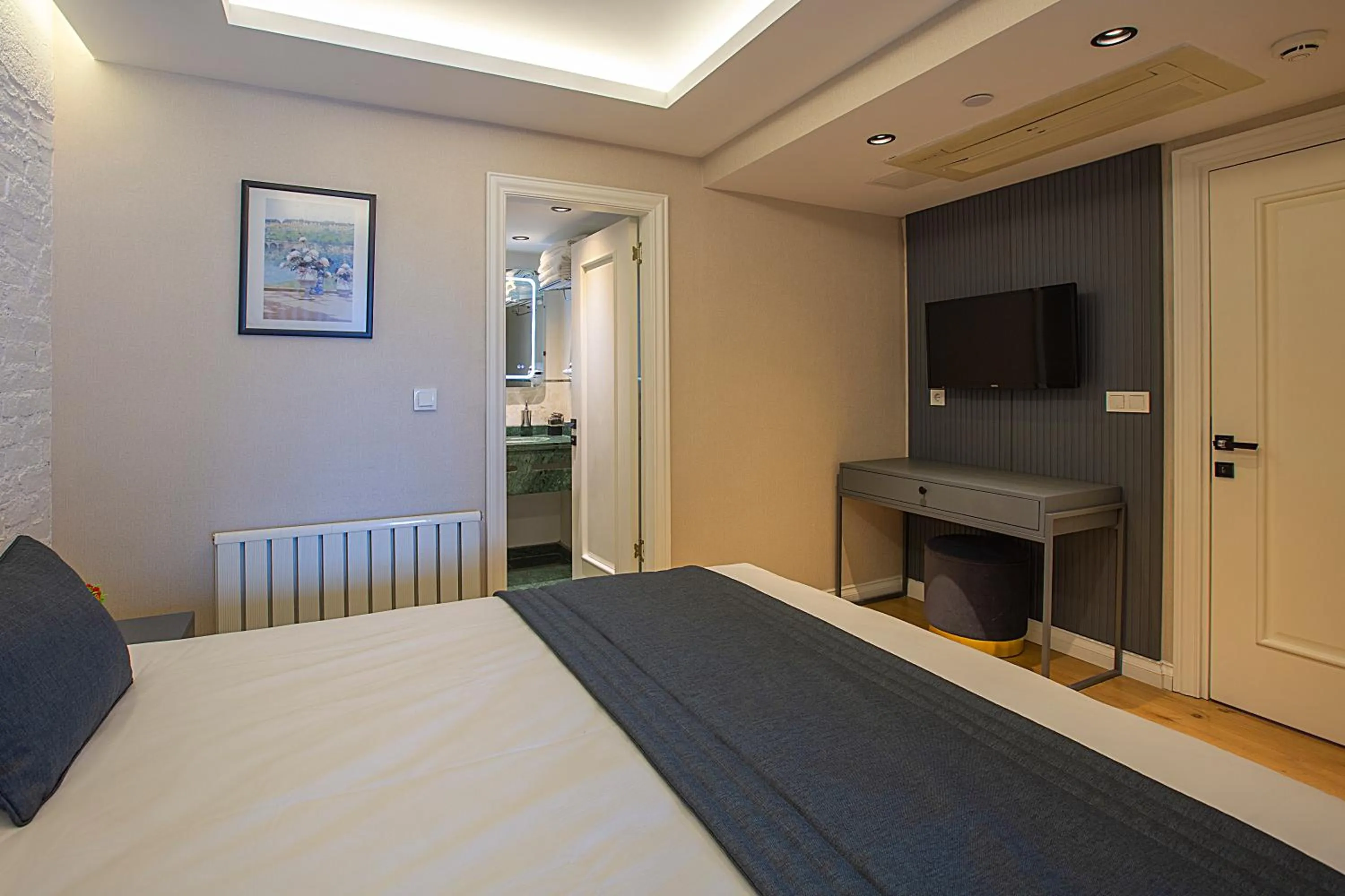 Bed in Moss Suites Hotel