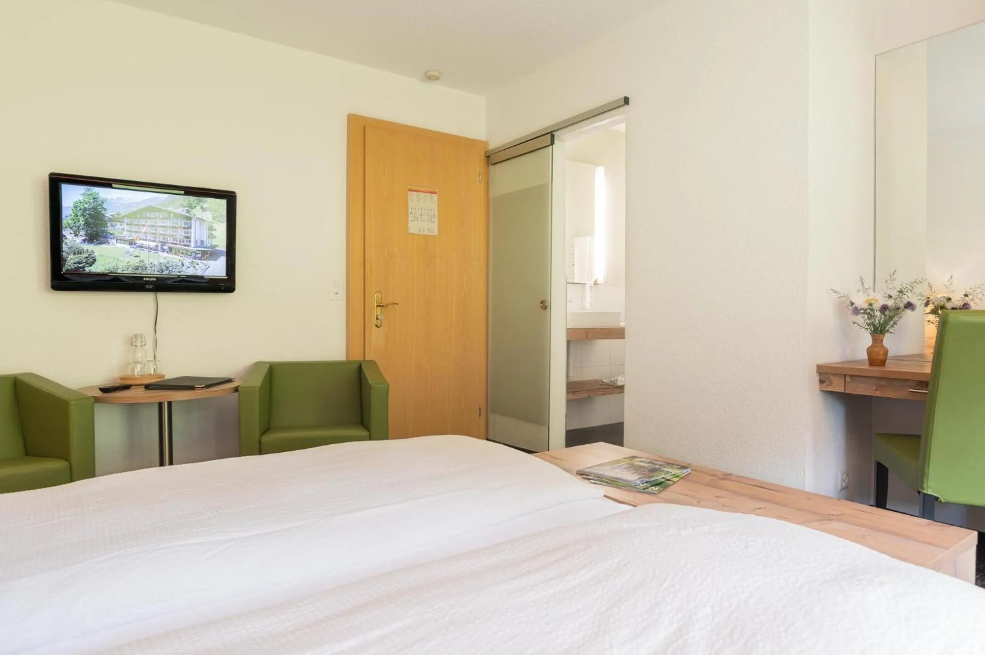 Photo of the whole room, Bed in Hotel Restaurant Alpina