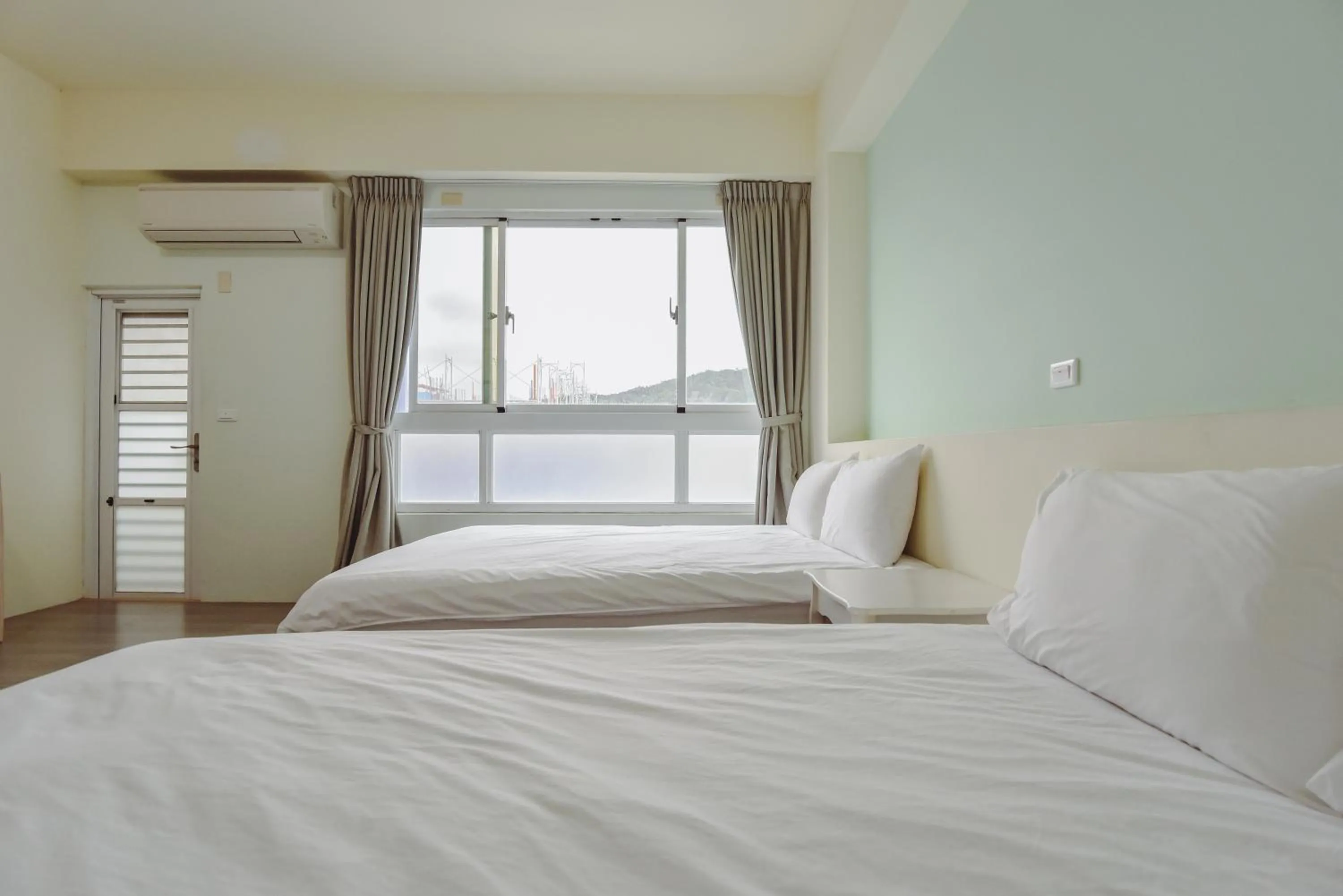 Bed in Siang Jhan B&B