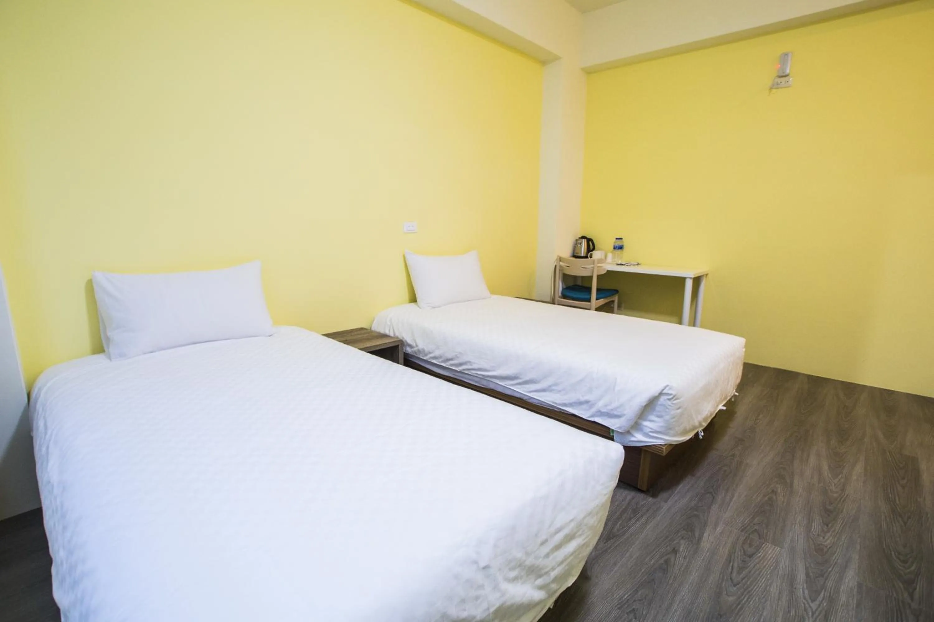 Bed in Siang Jhan B&B