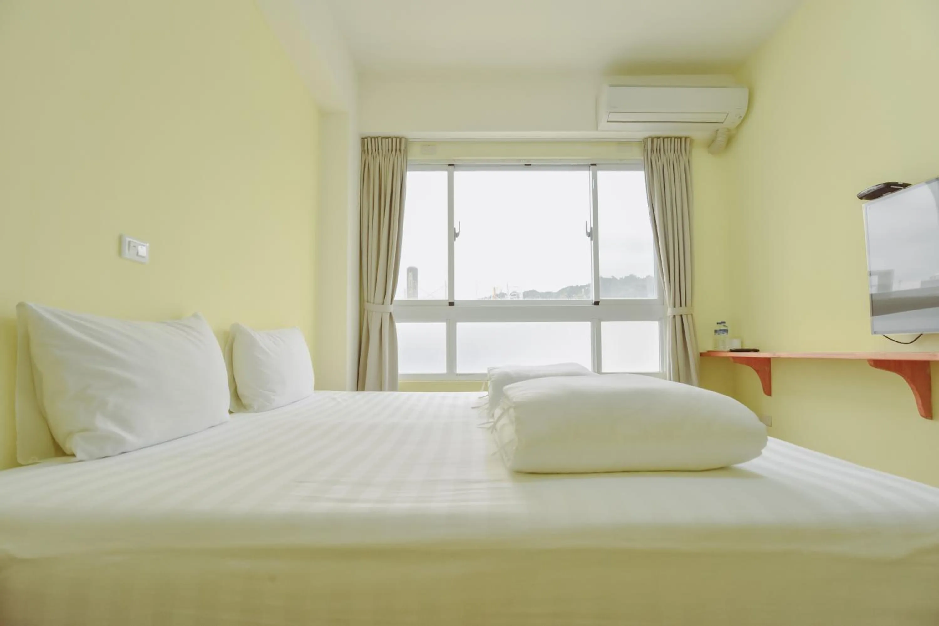 Bed in Siang Jhan B&B