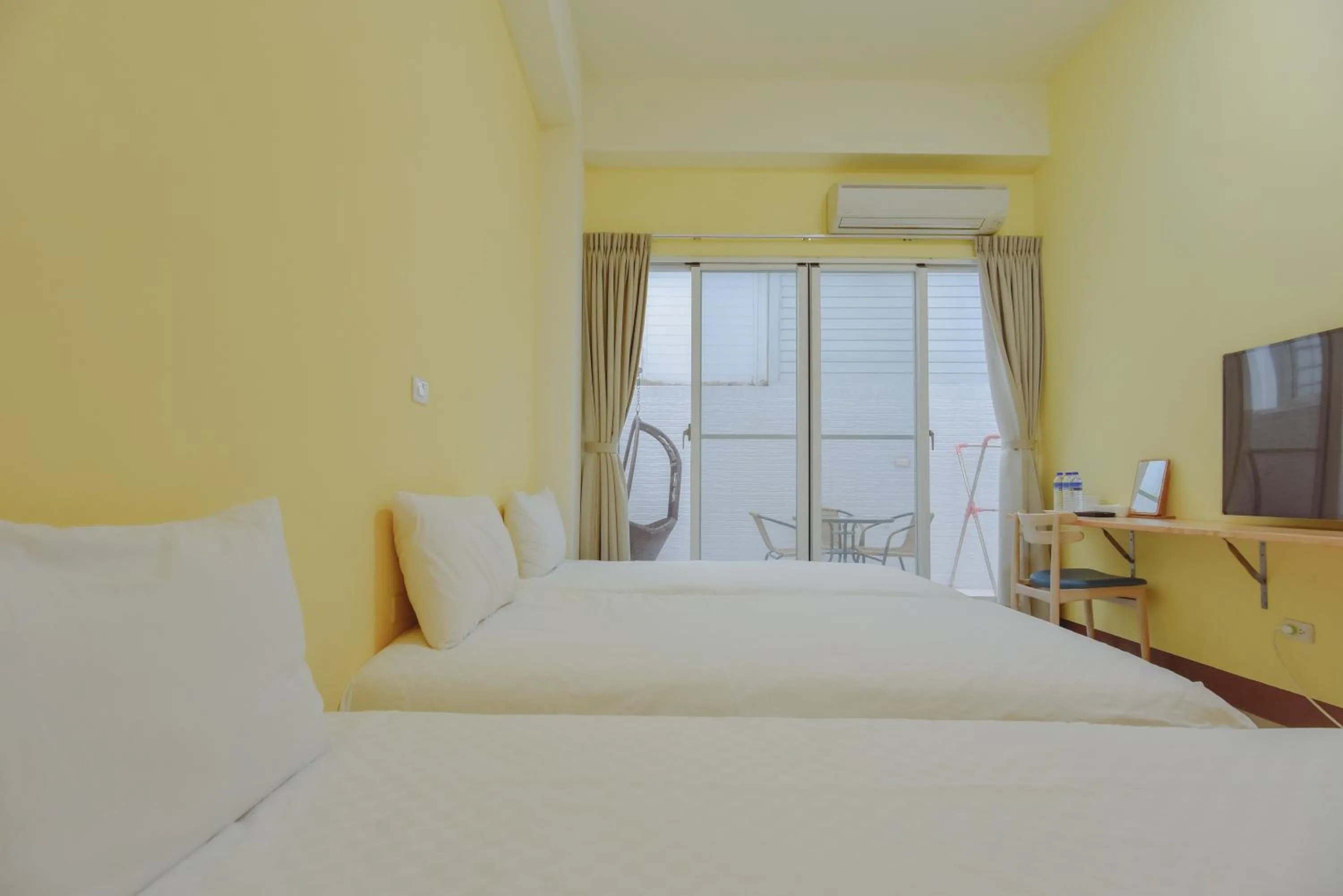 Bed in Siang Jhan B&B