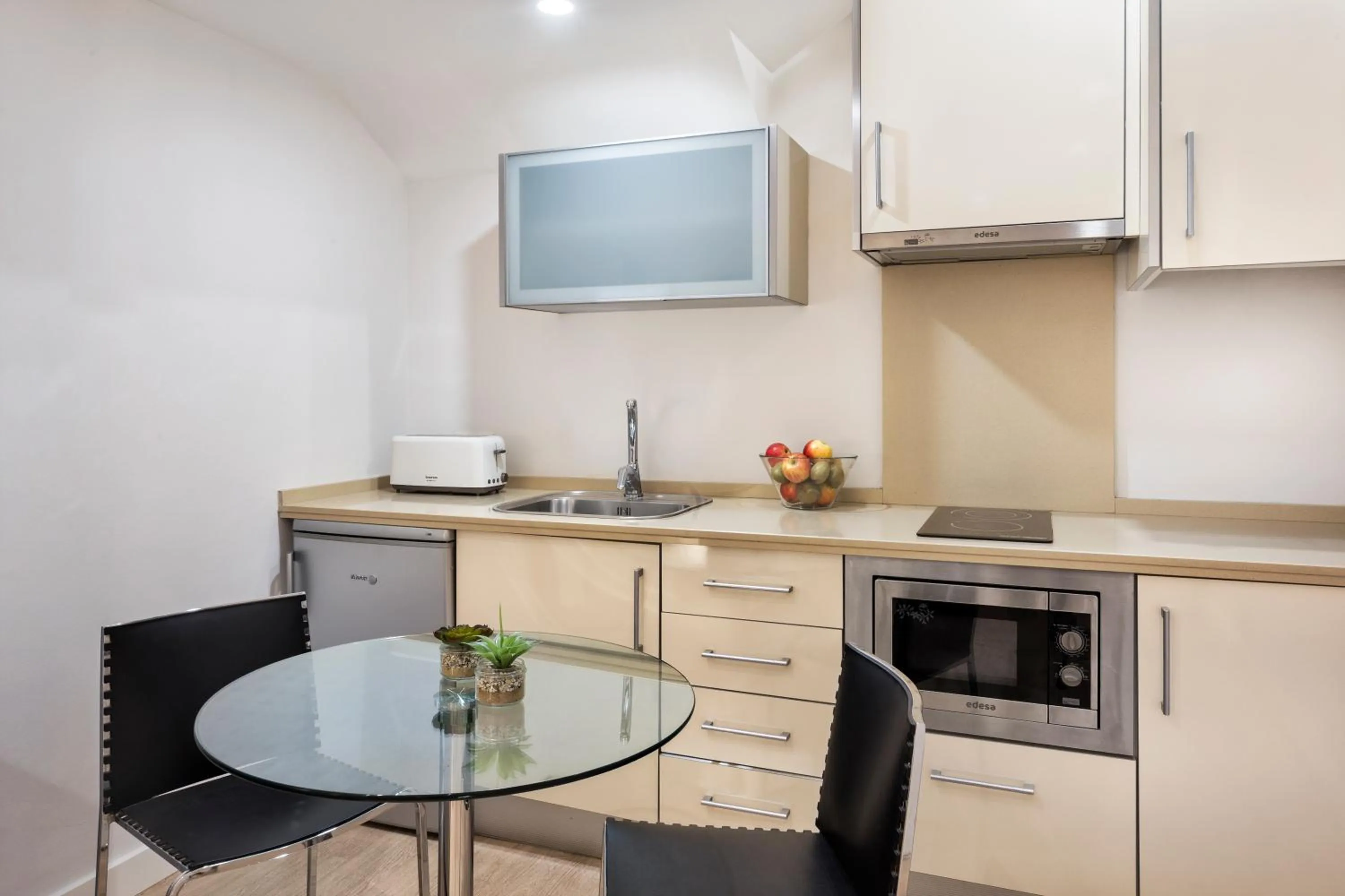 Kitchen or kitchenette in Apartamentos Metrópolis