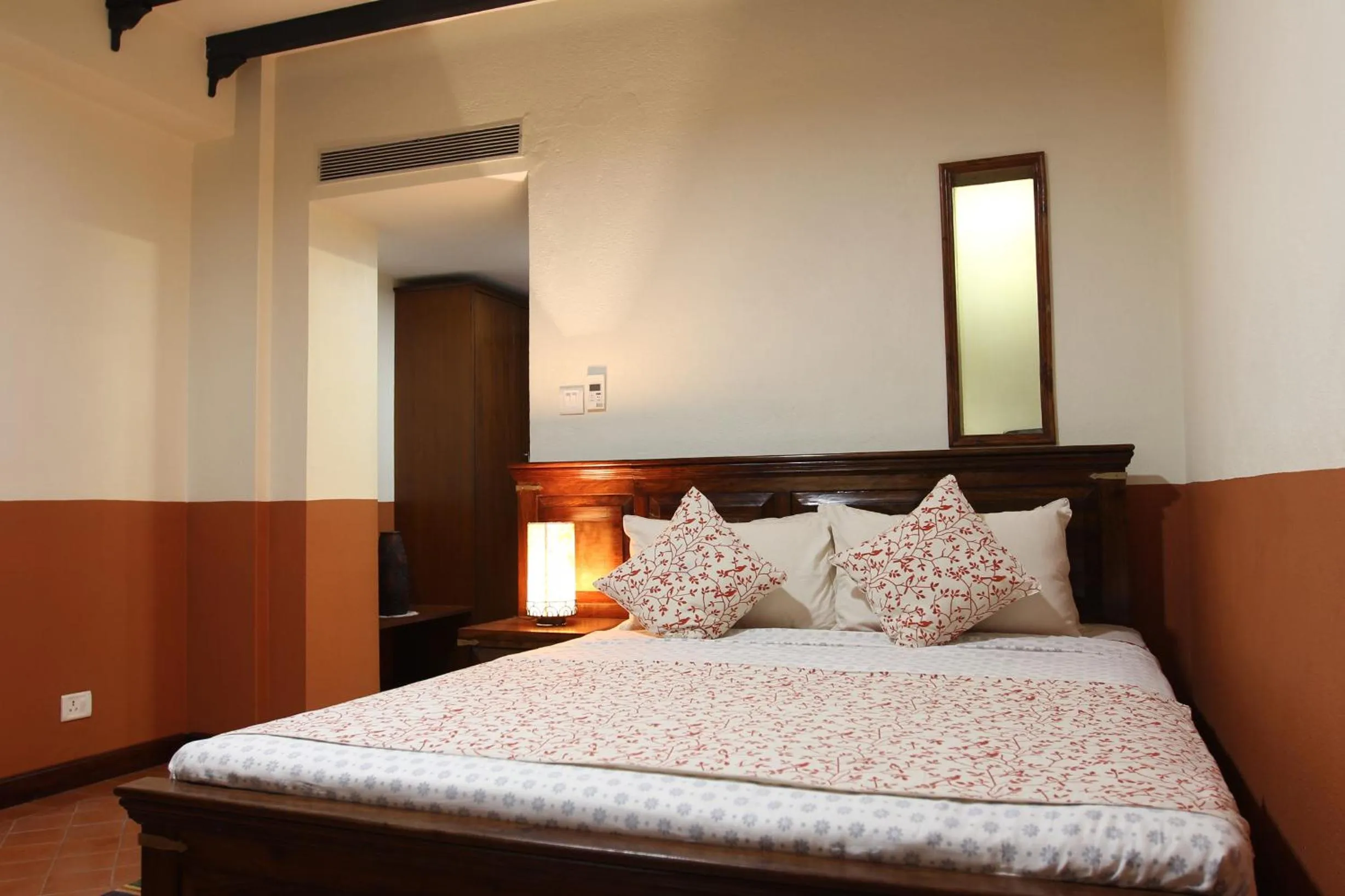 Bed in Traditional Comfort Boutique Hotel