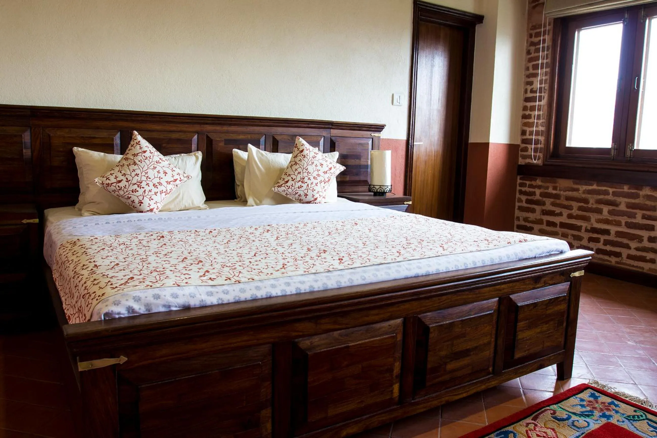 Bed in Traditional Comfort Boutique Hotel