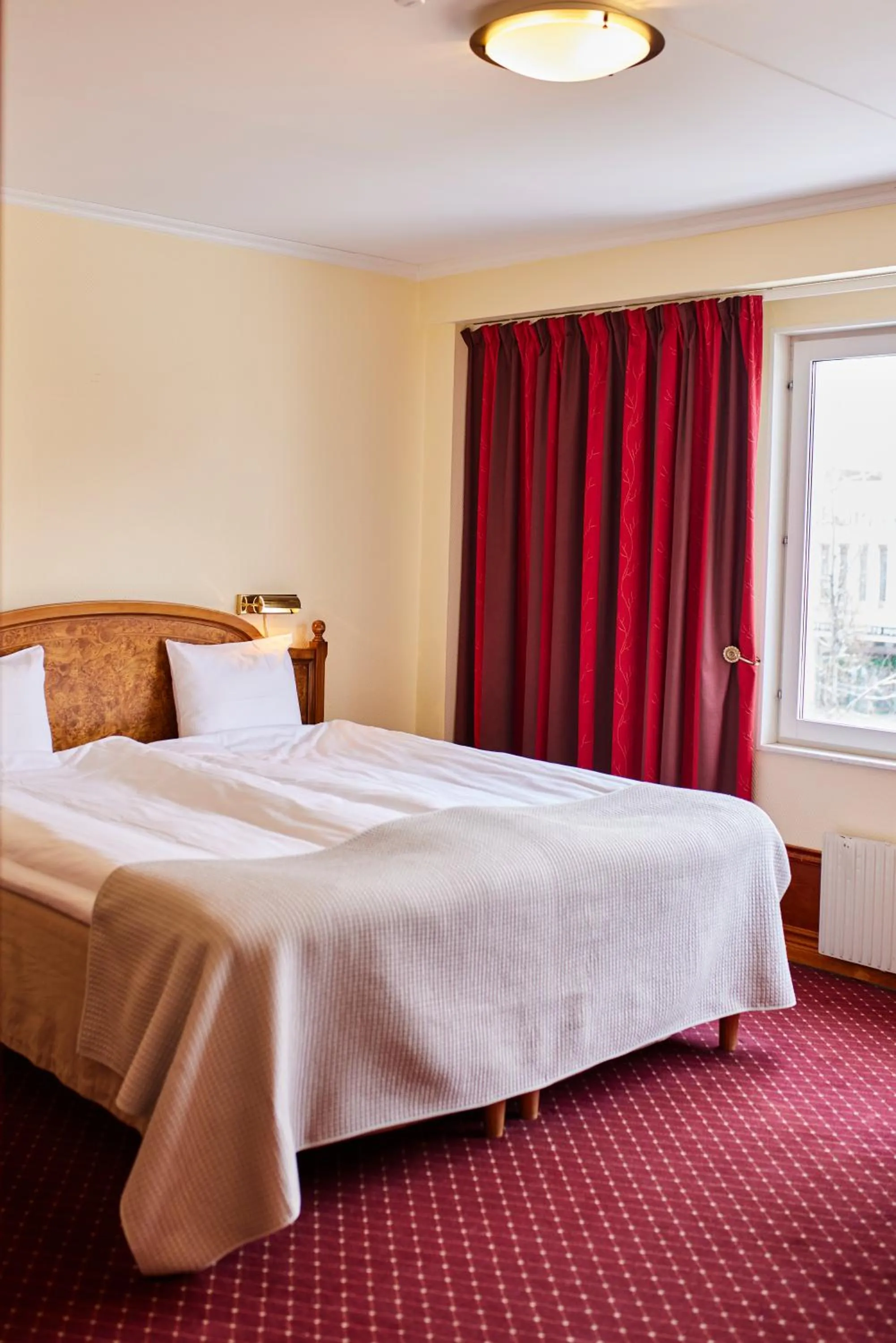 Bed in Home Hotel Smedjan