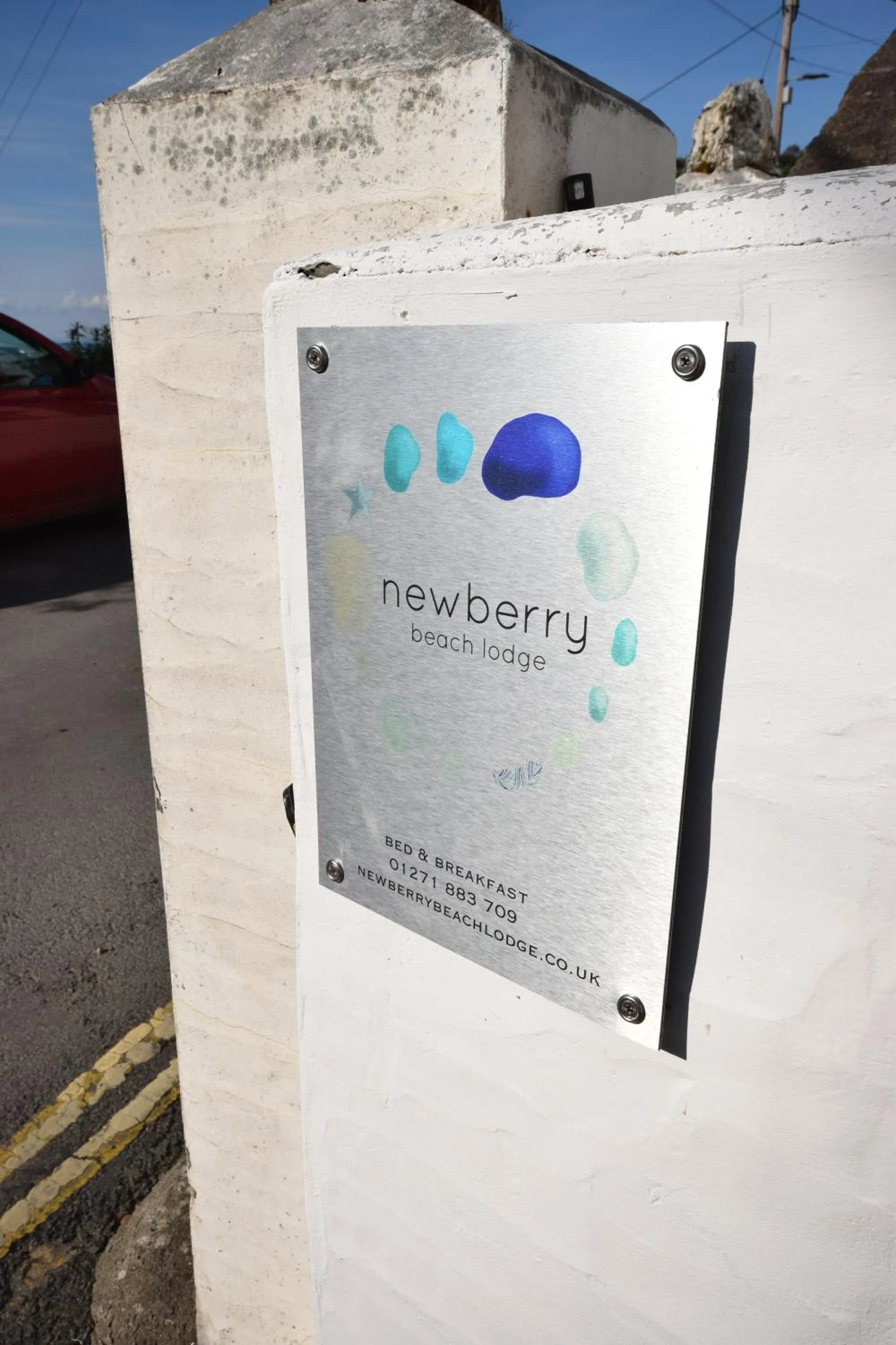 Property logo or sign in Newberry Beach lodge