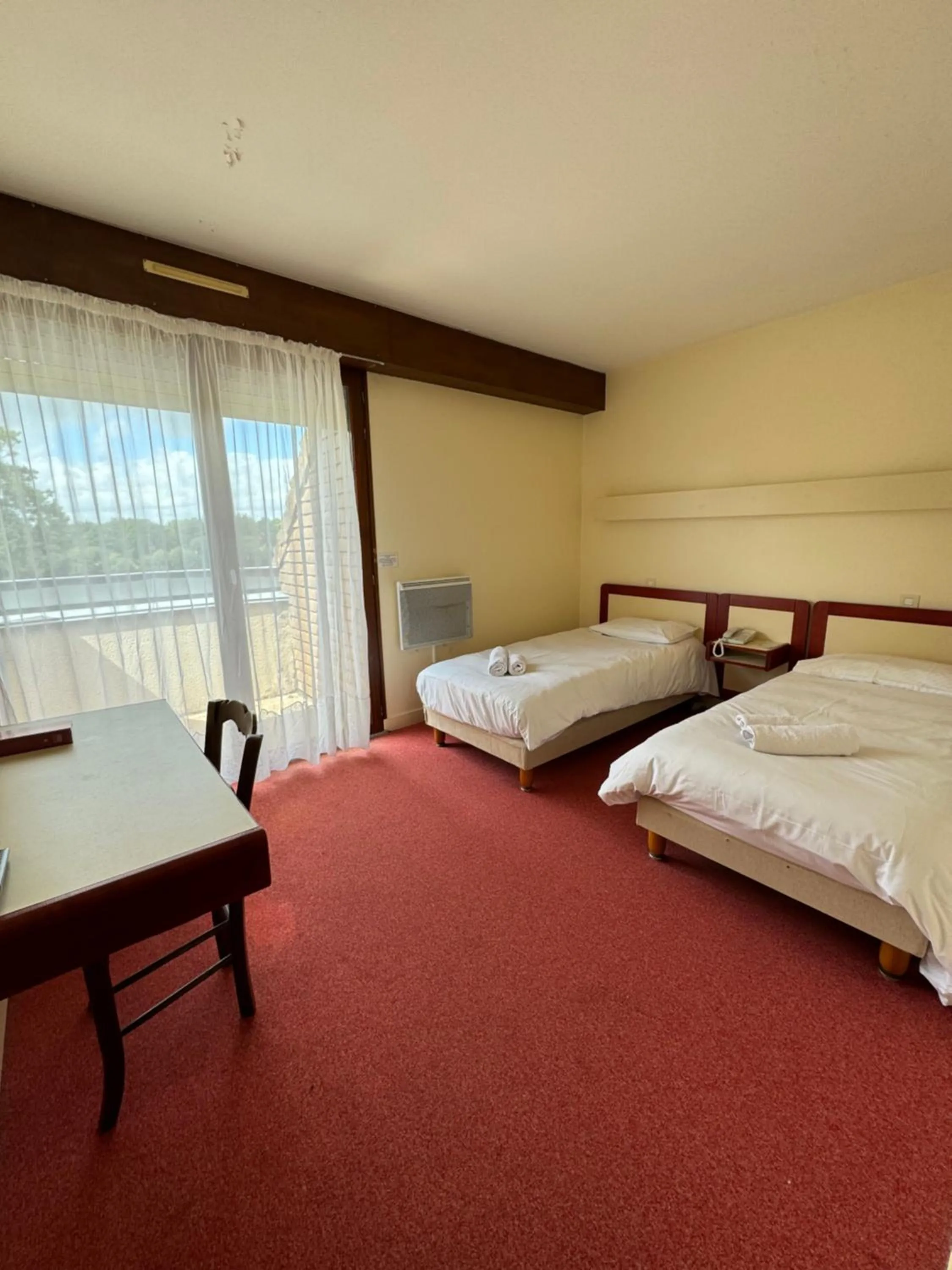 Bed in Auberge d'Andaines