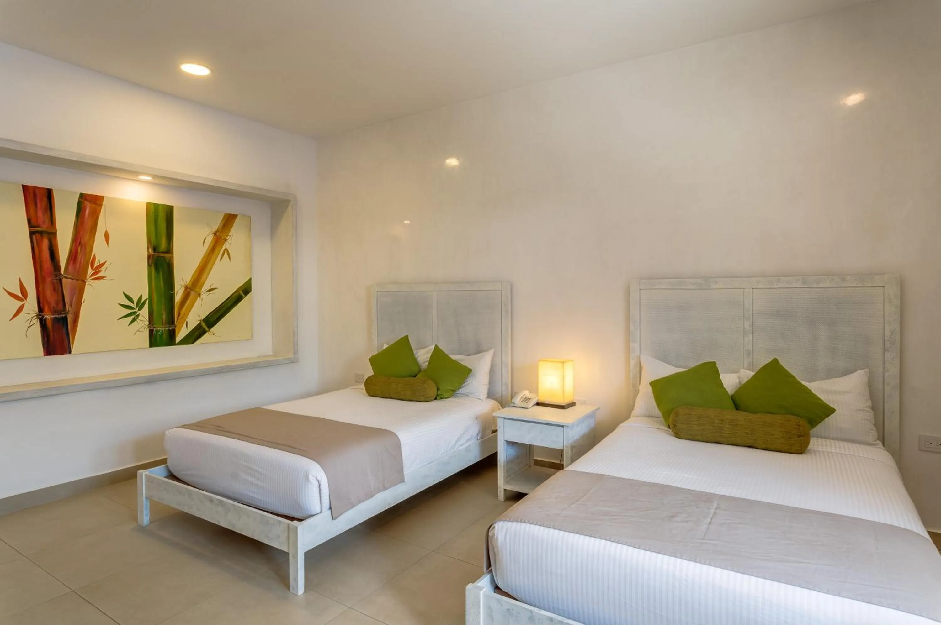 Bed in Aldea Thai by Mistik Vacation Rentals