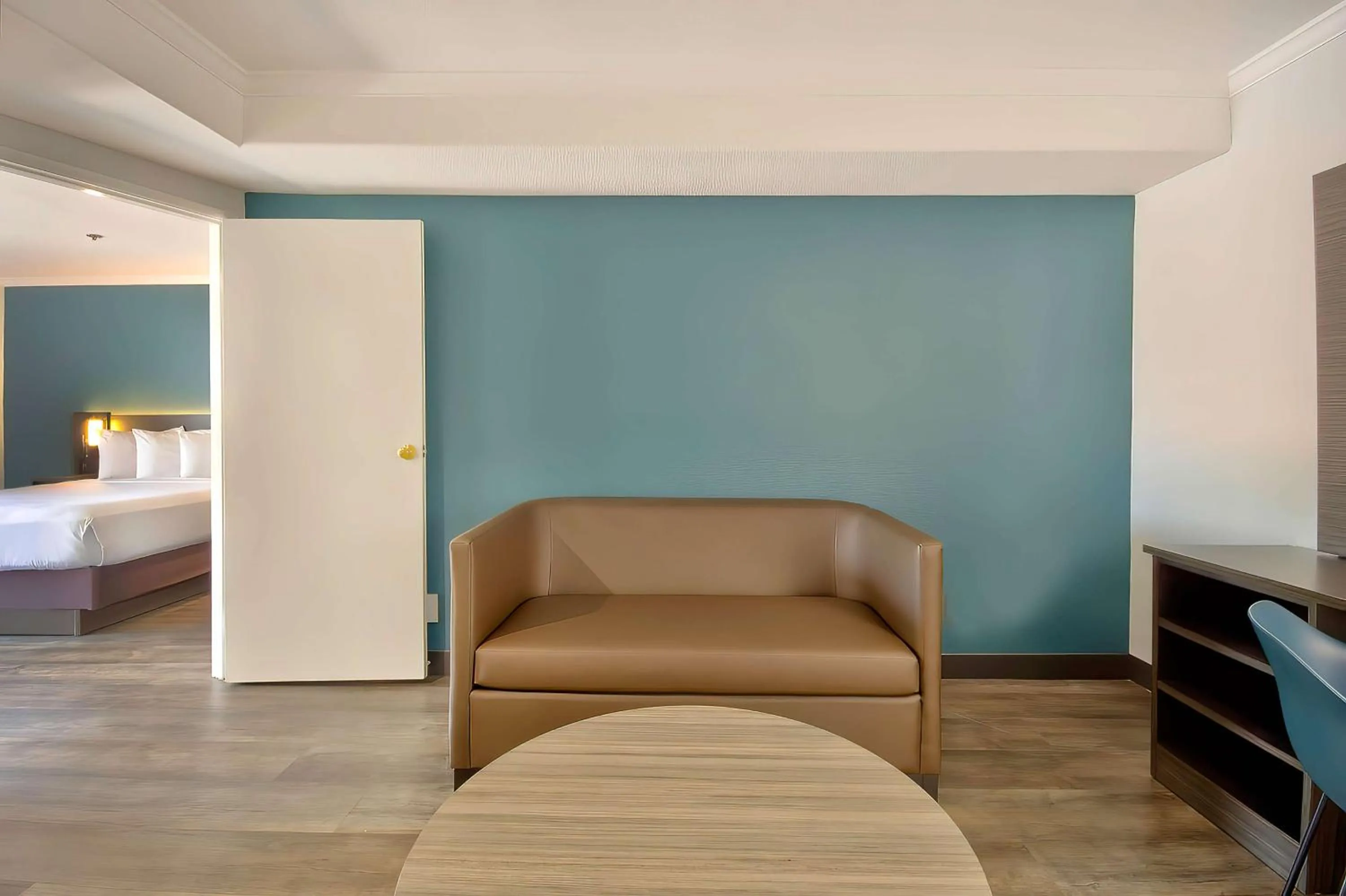 Seating area, Bed in Studio 6 Suites Lawndale, CA South Bay