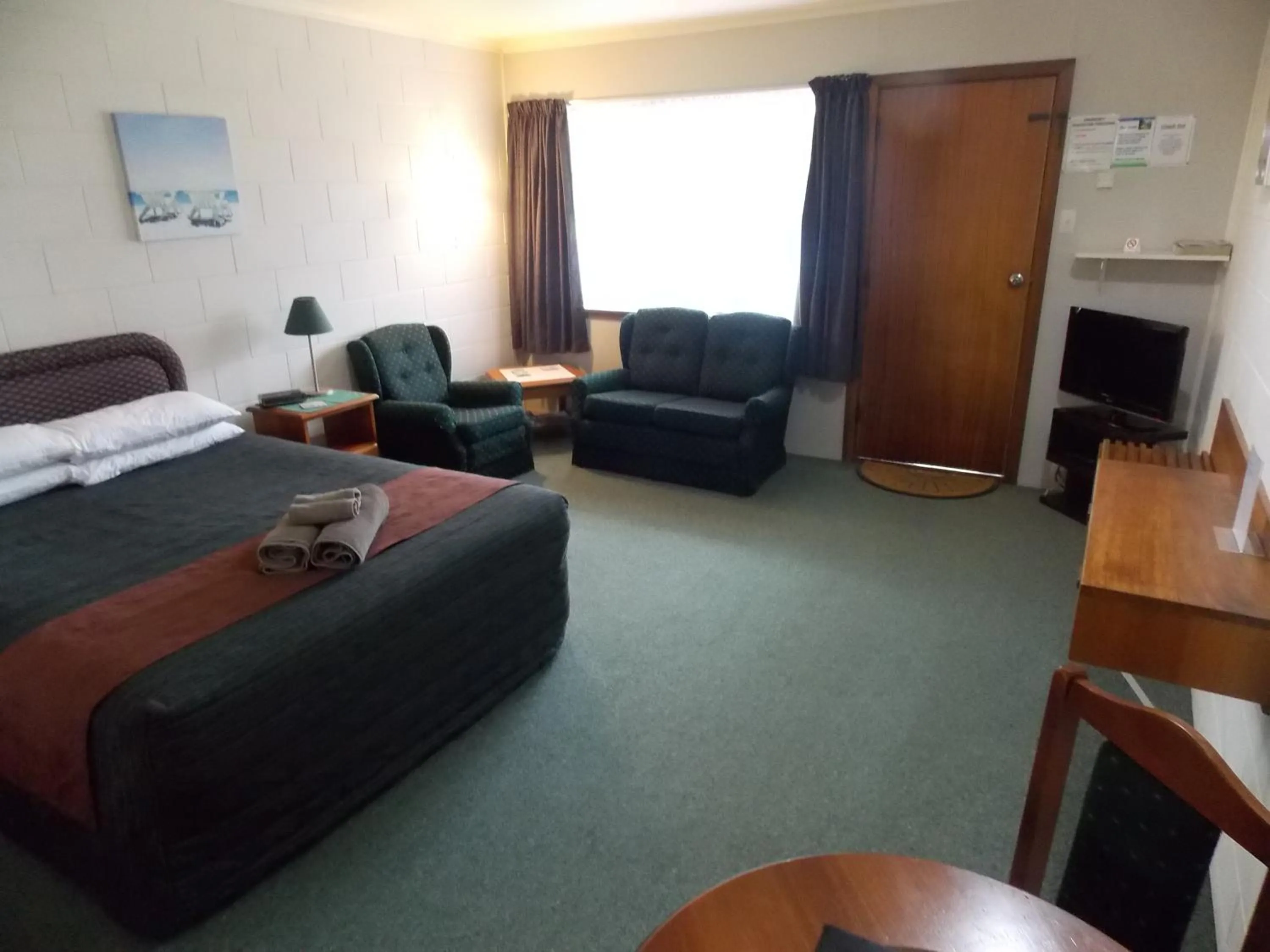 Living room in Rangiora Lodge Motel