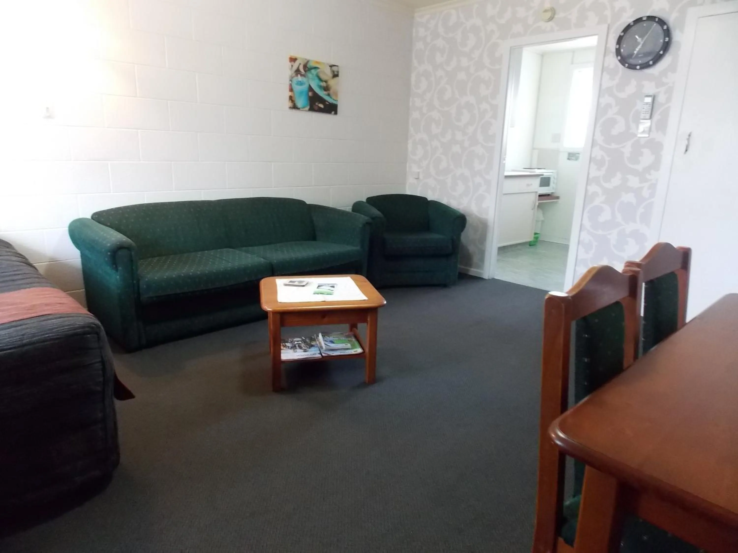Living room in Rangiora Lodge Motel