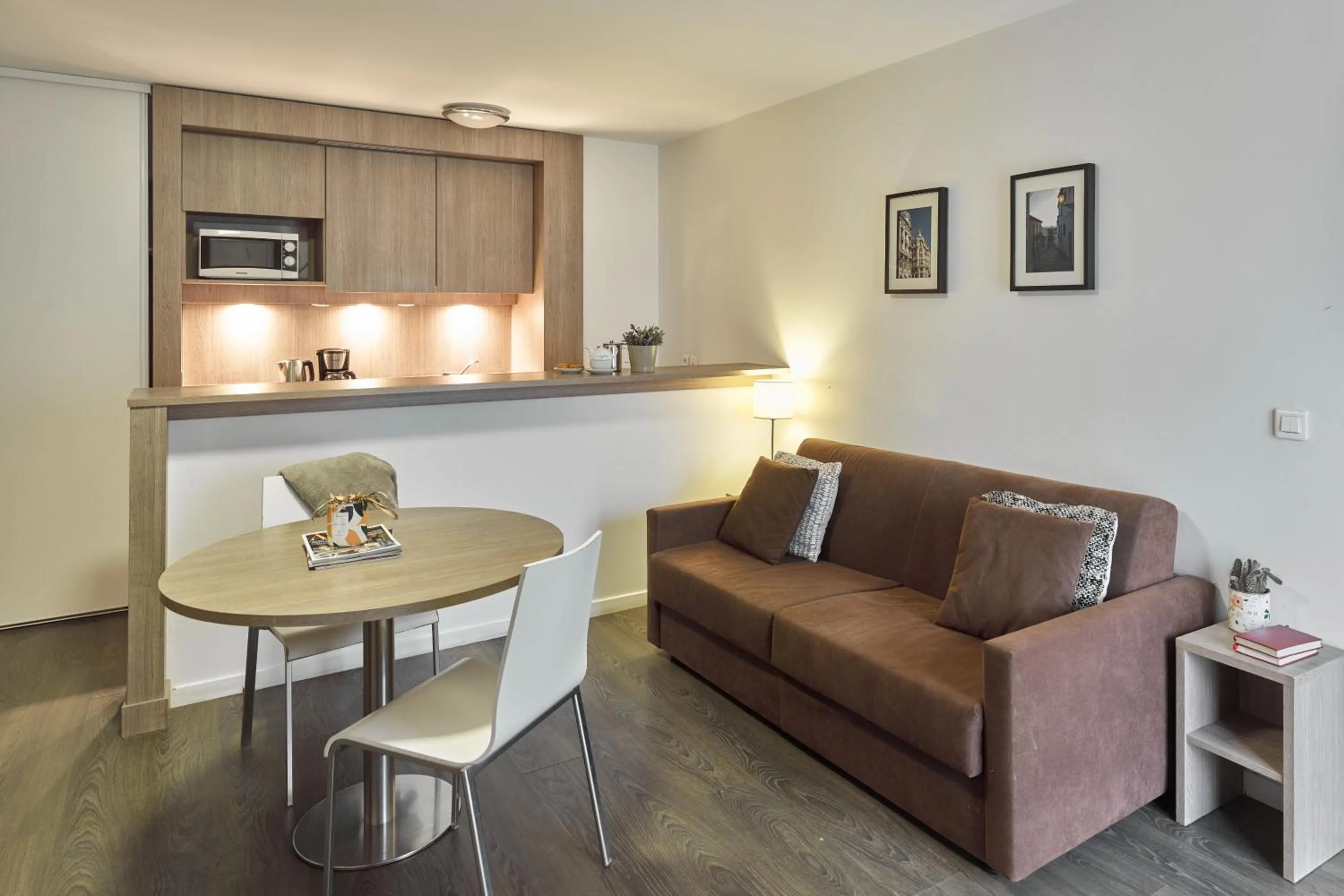 Living room in Zenitude Hôtel Résidences Roissy Village