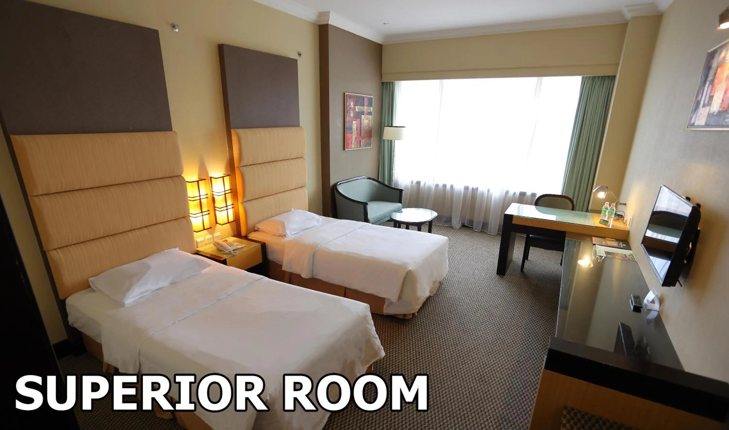 Bed in Dynasty Hotel Miri